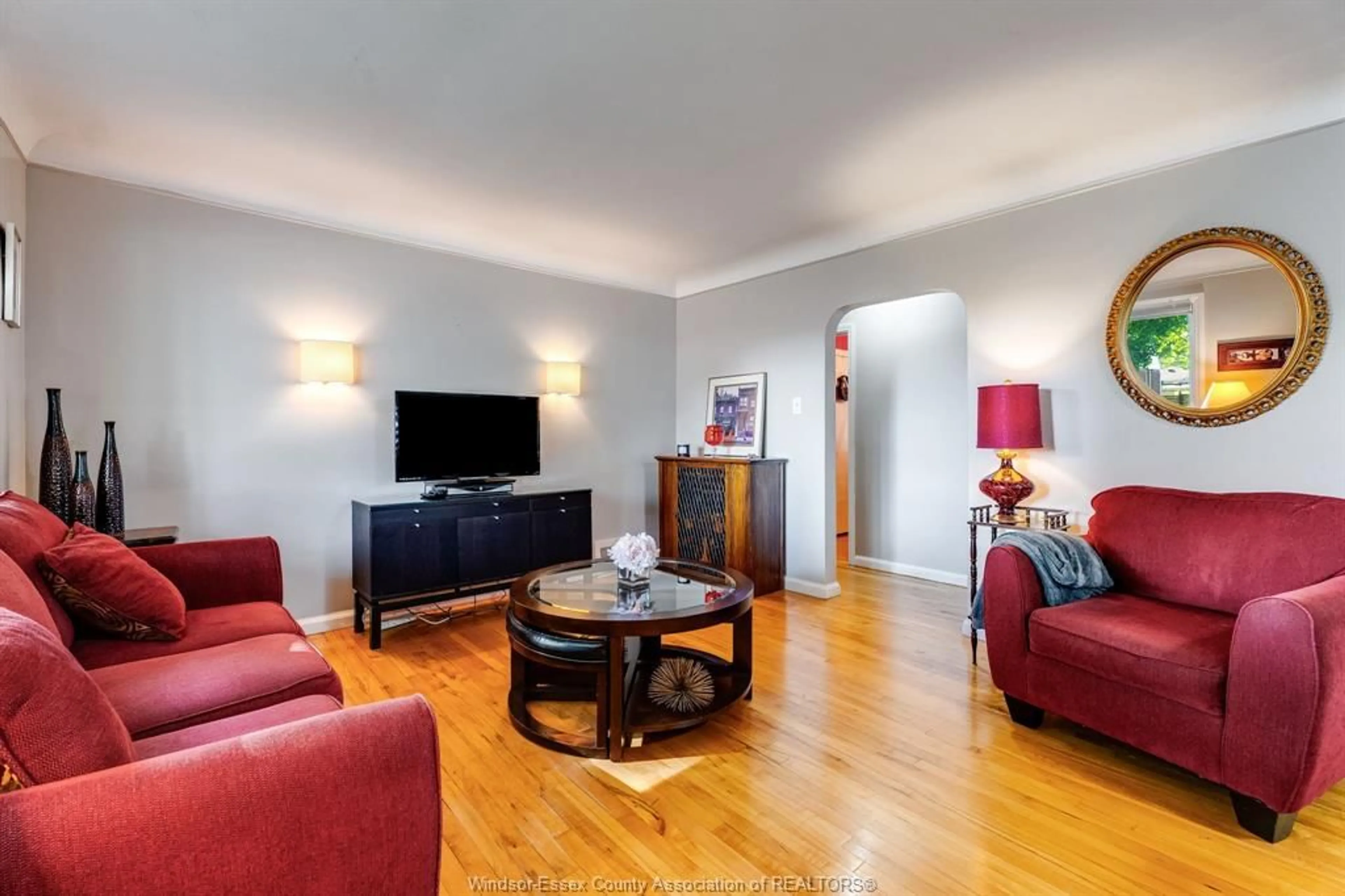 Living room with furniture, wood/laminate floor for 2840 Randolph Ave, Windsor Ontario N9E 3E2