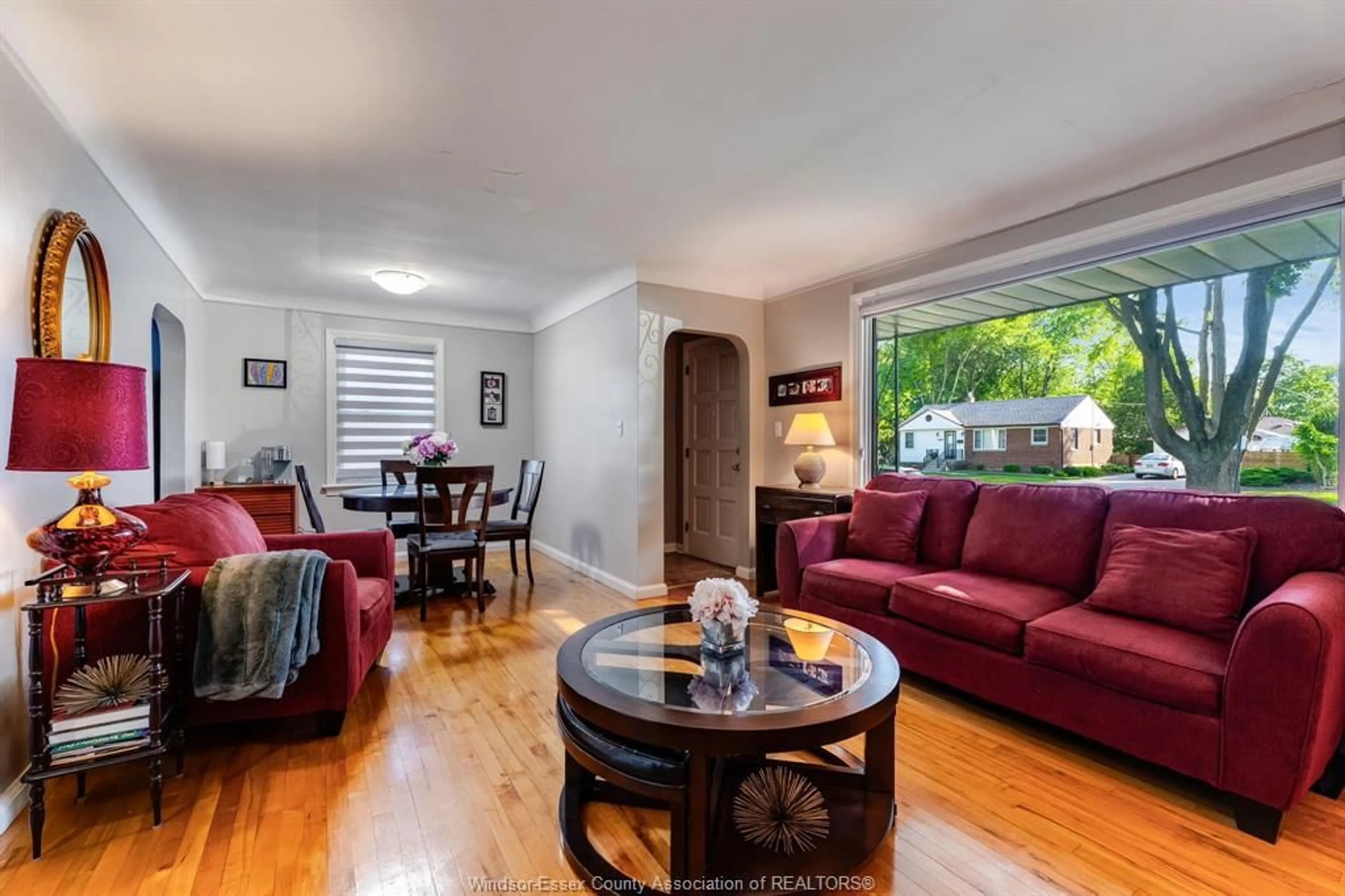 Living room with furniture, wood/laminate floor for 2840 Randolph Ave, Windsor Ontario N9E 3E2