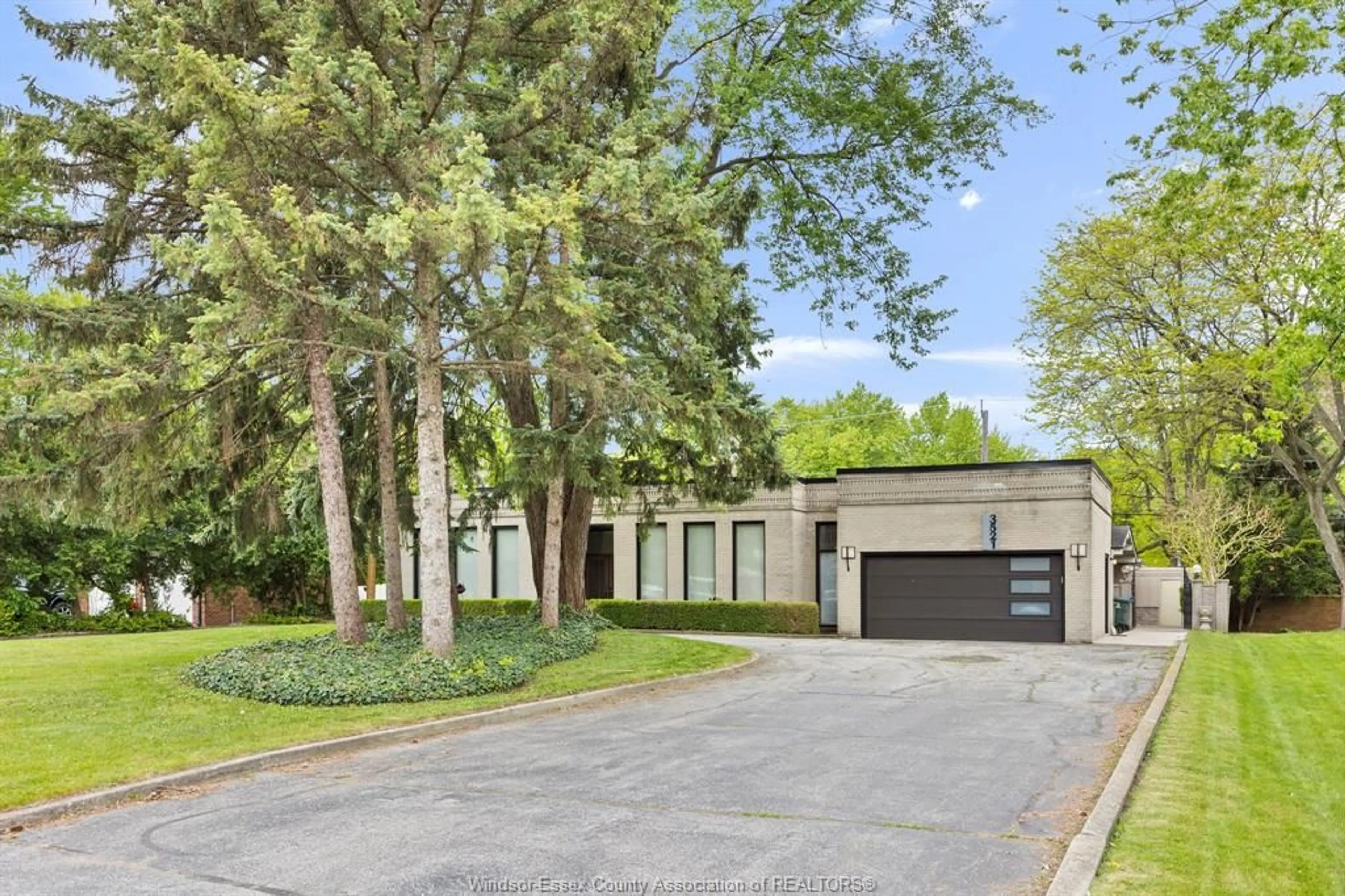 Home with brick exterior material, street for 3521 OUELLETTE, Windsor Ontario N9E 3M3