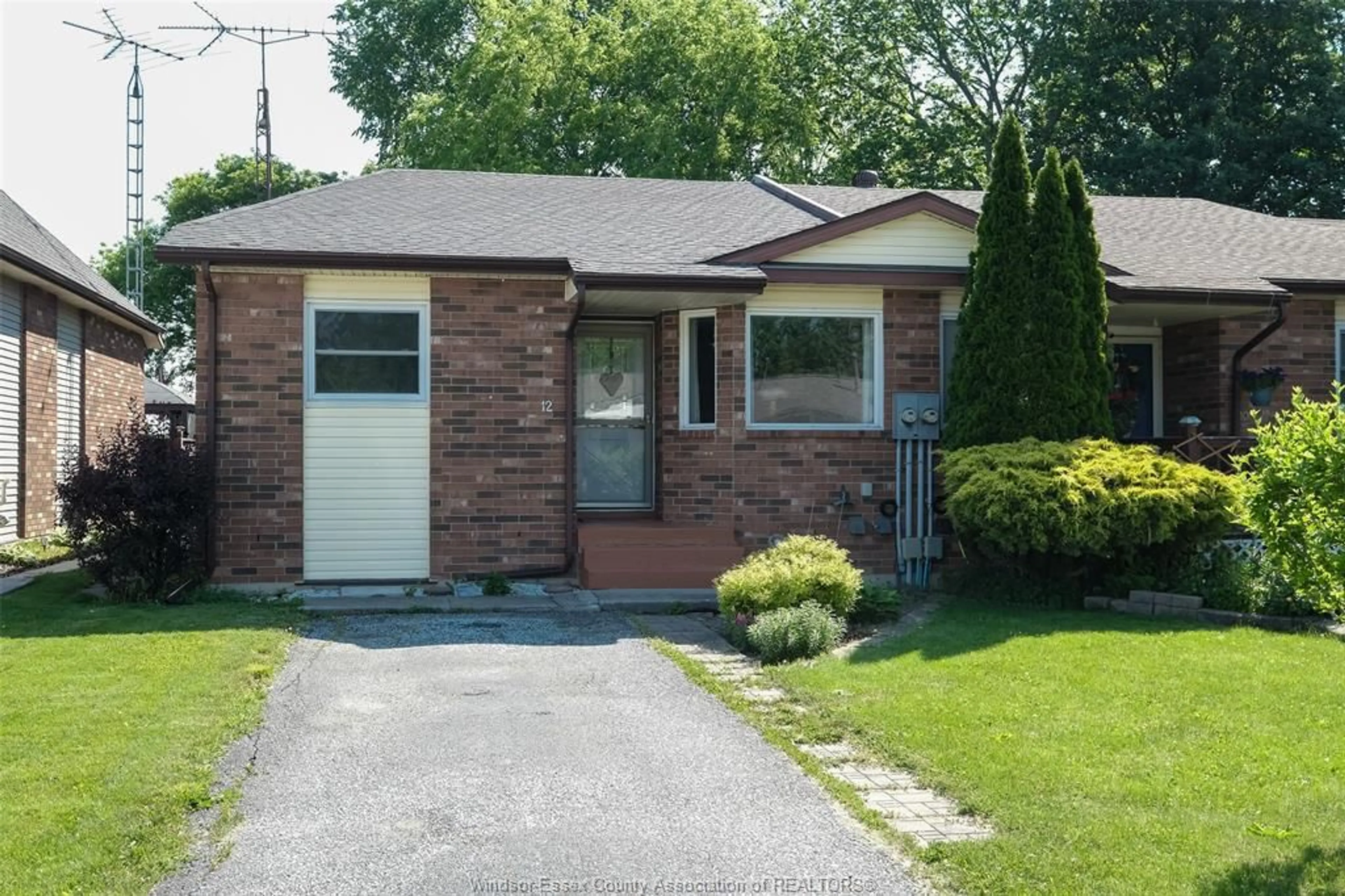 Home with brick exterior material, street for 12 KELLY Cres, Tilbury Ontario N0P 2L0