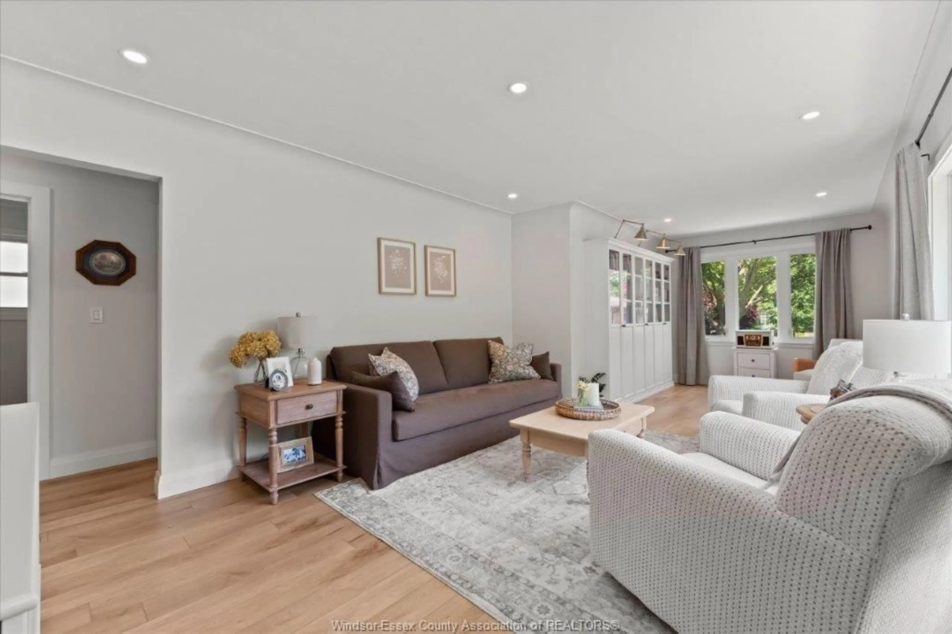 Living room with furniture, wood/laminate floor for 3501 DANDURAND, Windsor Ontario N9E 2G2
