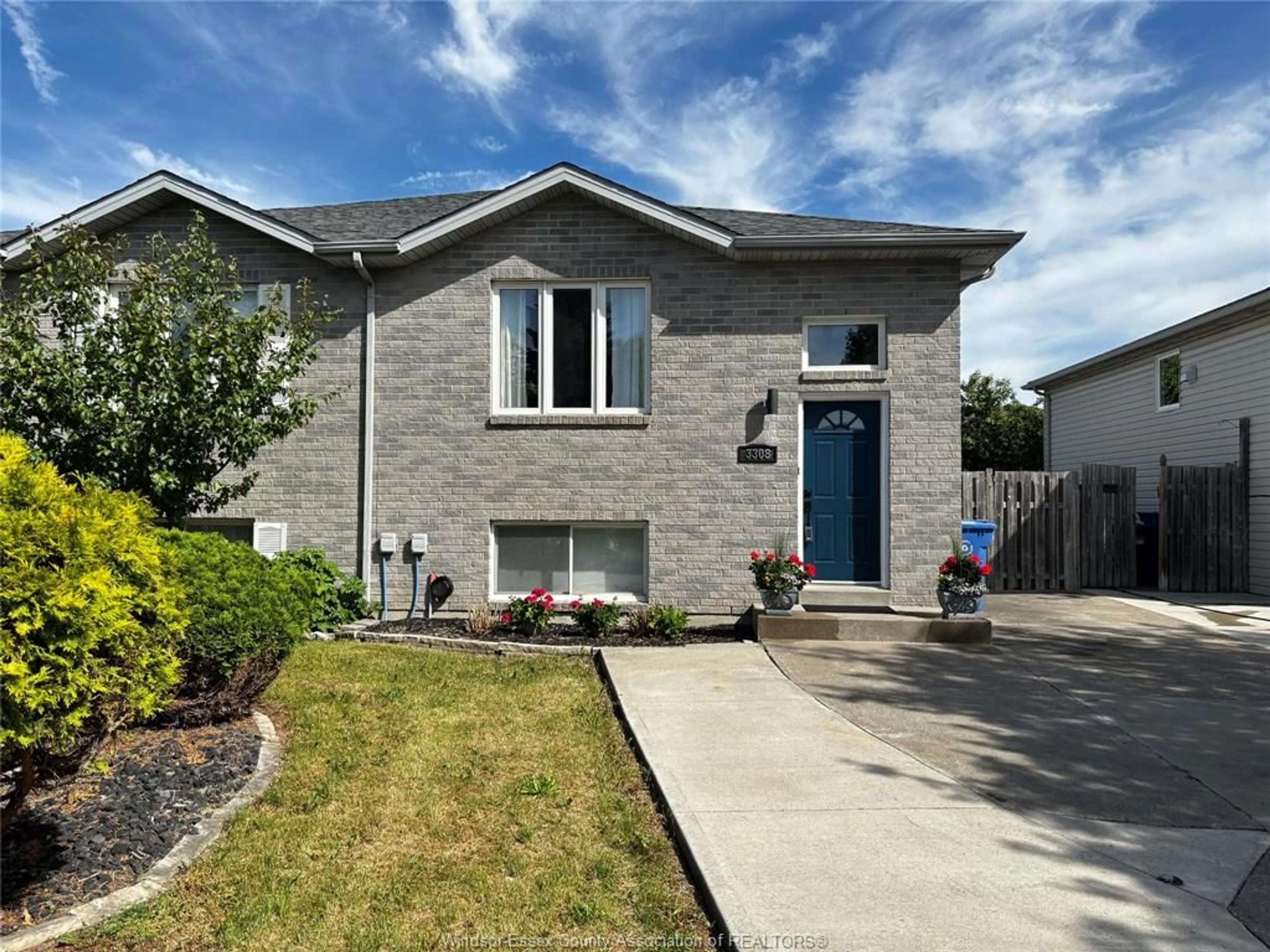 Home with brick exterior material, street for 3308 CANDLEWOOD Cres, Windsor Ontario N8W 5M5