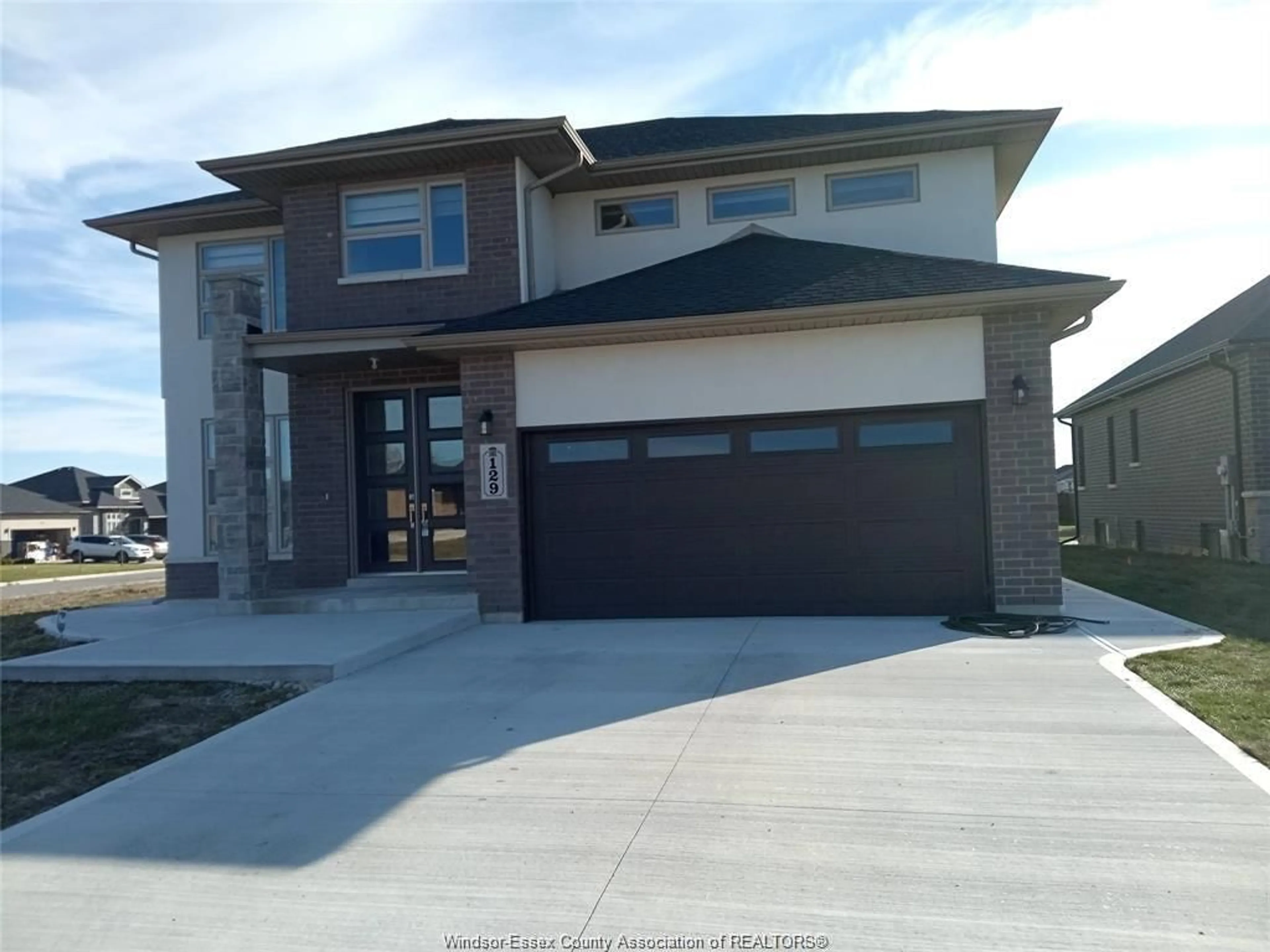 Home with brick exterior material, street for 129 WHELAN, Amherstburg Ontario N9V 0A9