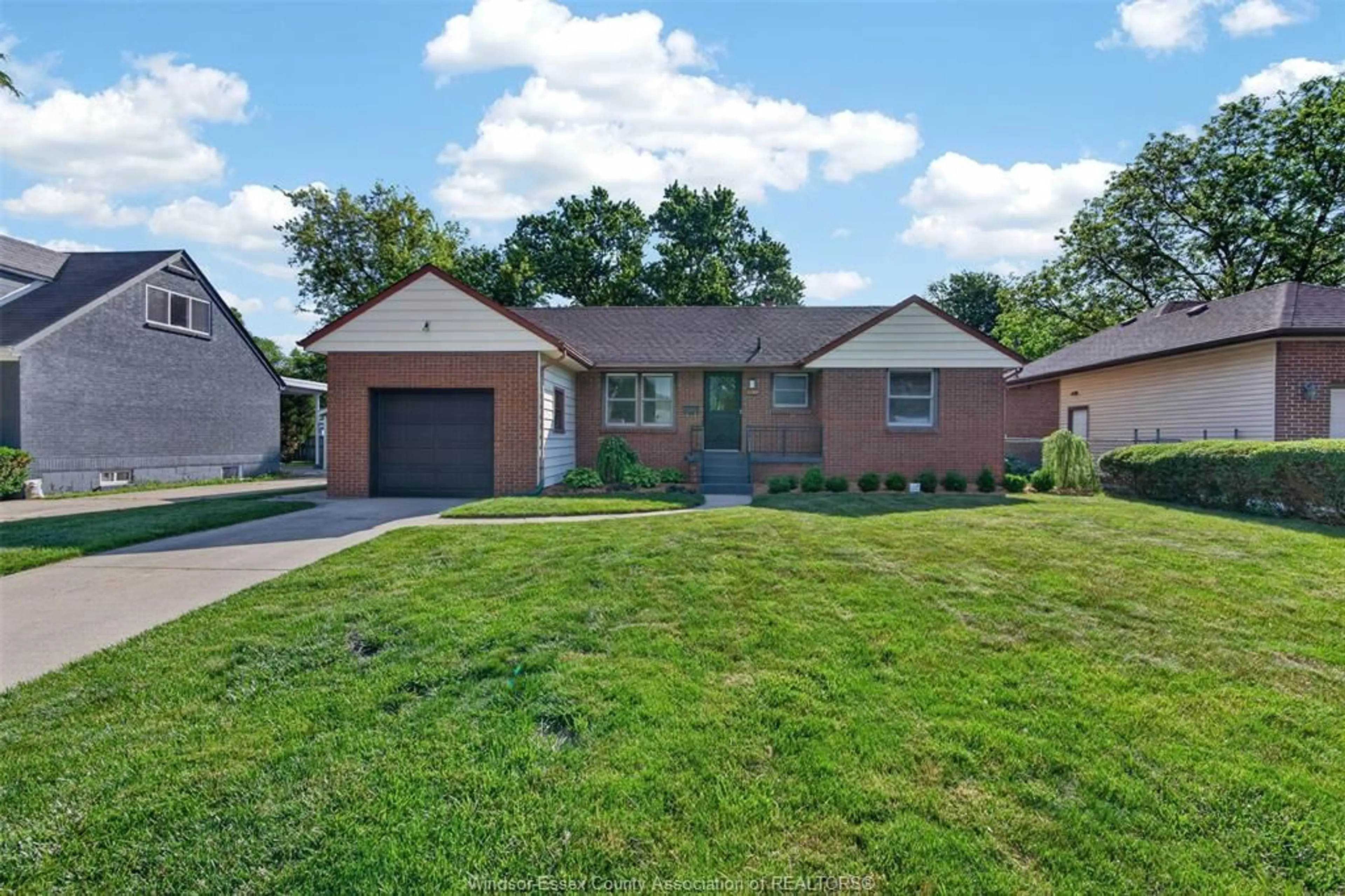 Home with brick exterior material, street for 3120 ACADEMY Dr, Windsor Ontario N9E 2H4