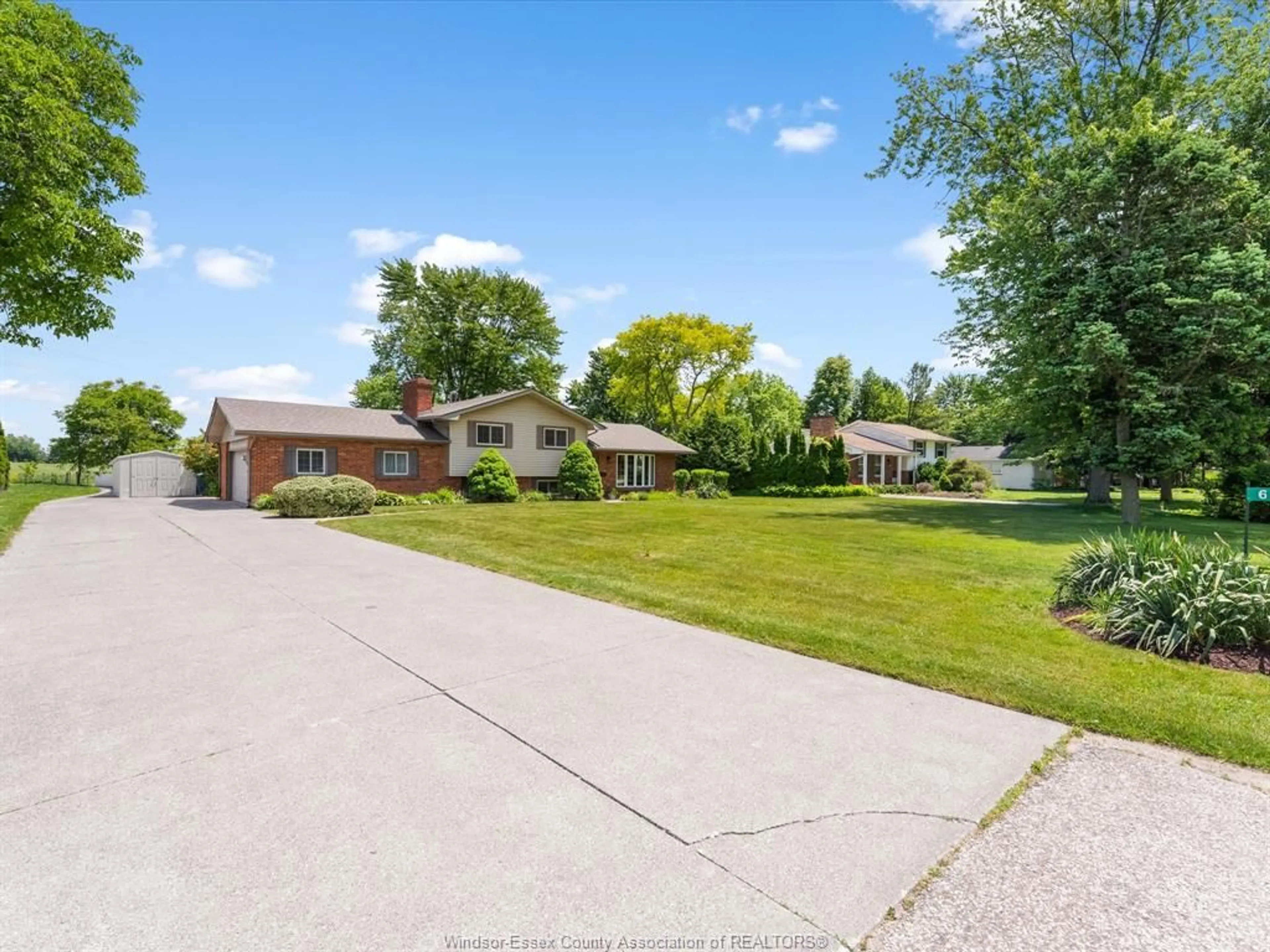 A pic from outside/outdoor area/front of a property/back of a property/a pic from drone, street for 6560 DISPUTED Rd, LaSalle Ontario N9H 1X9