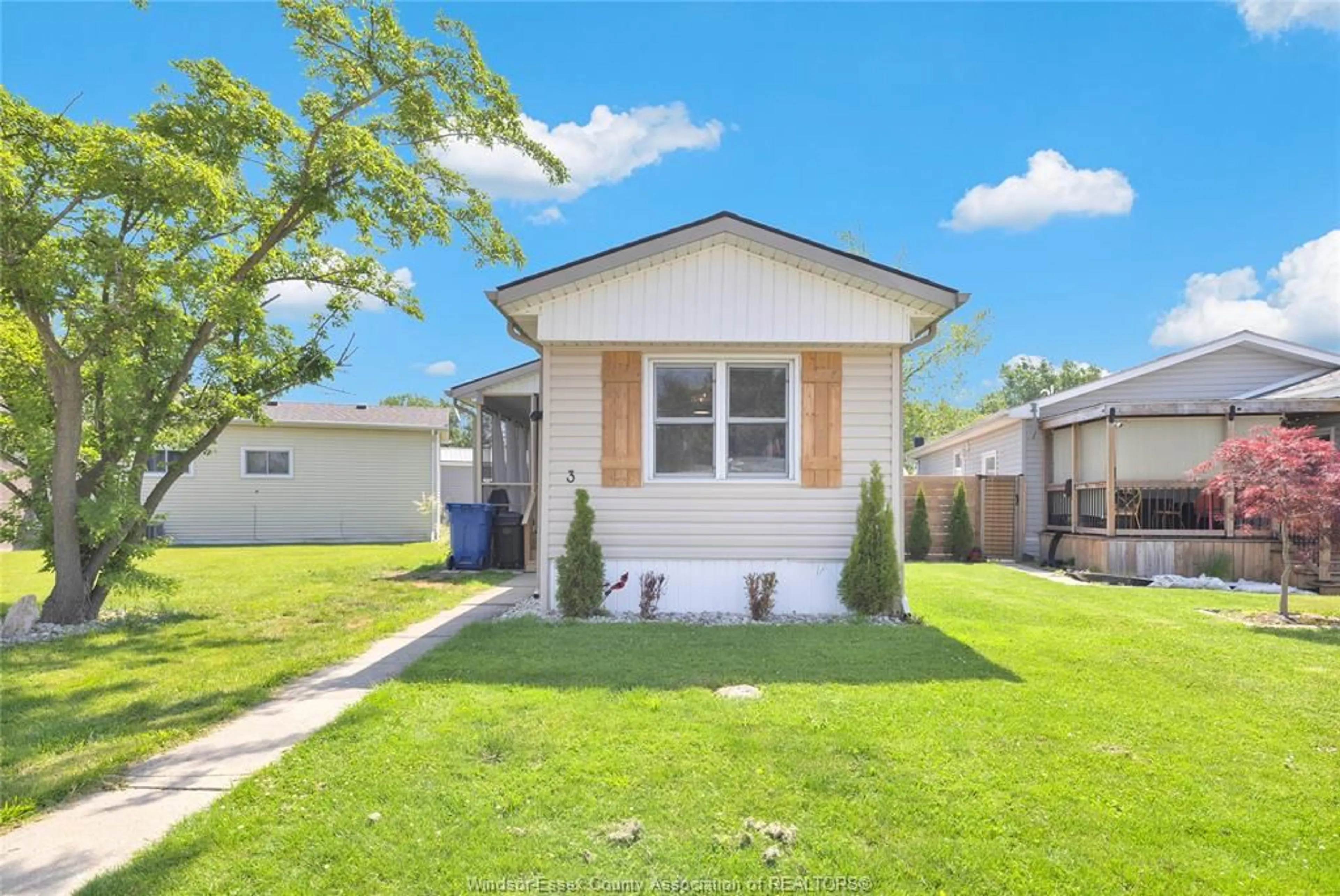 Home with vinyl exterior material, street for 3 LILAC, McGregor Ontario N0R 1J0