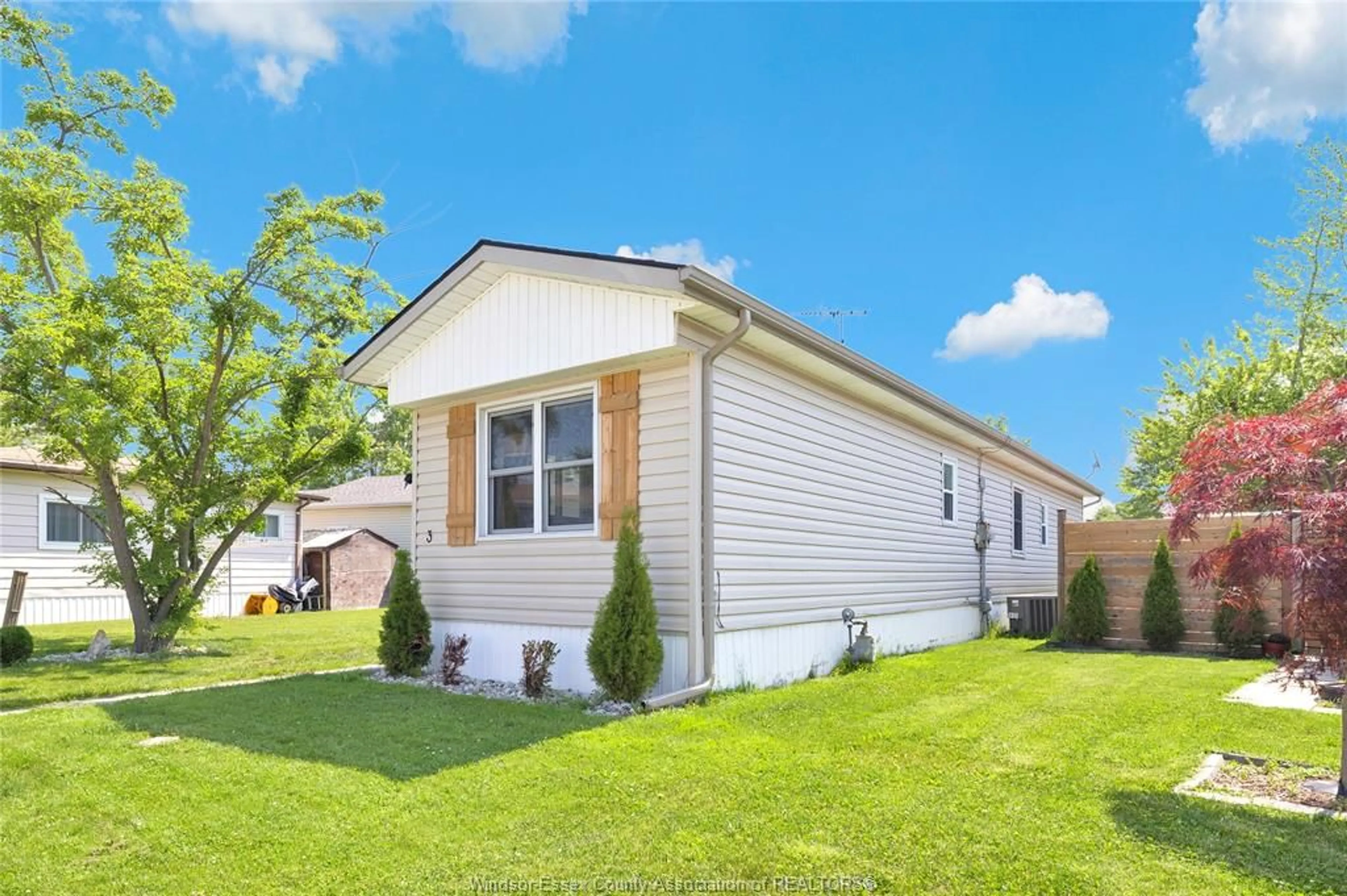 Home with vinyl exterior material, street for 3 LILAC, McGregor Ontario N0R 1J0