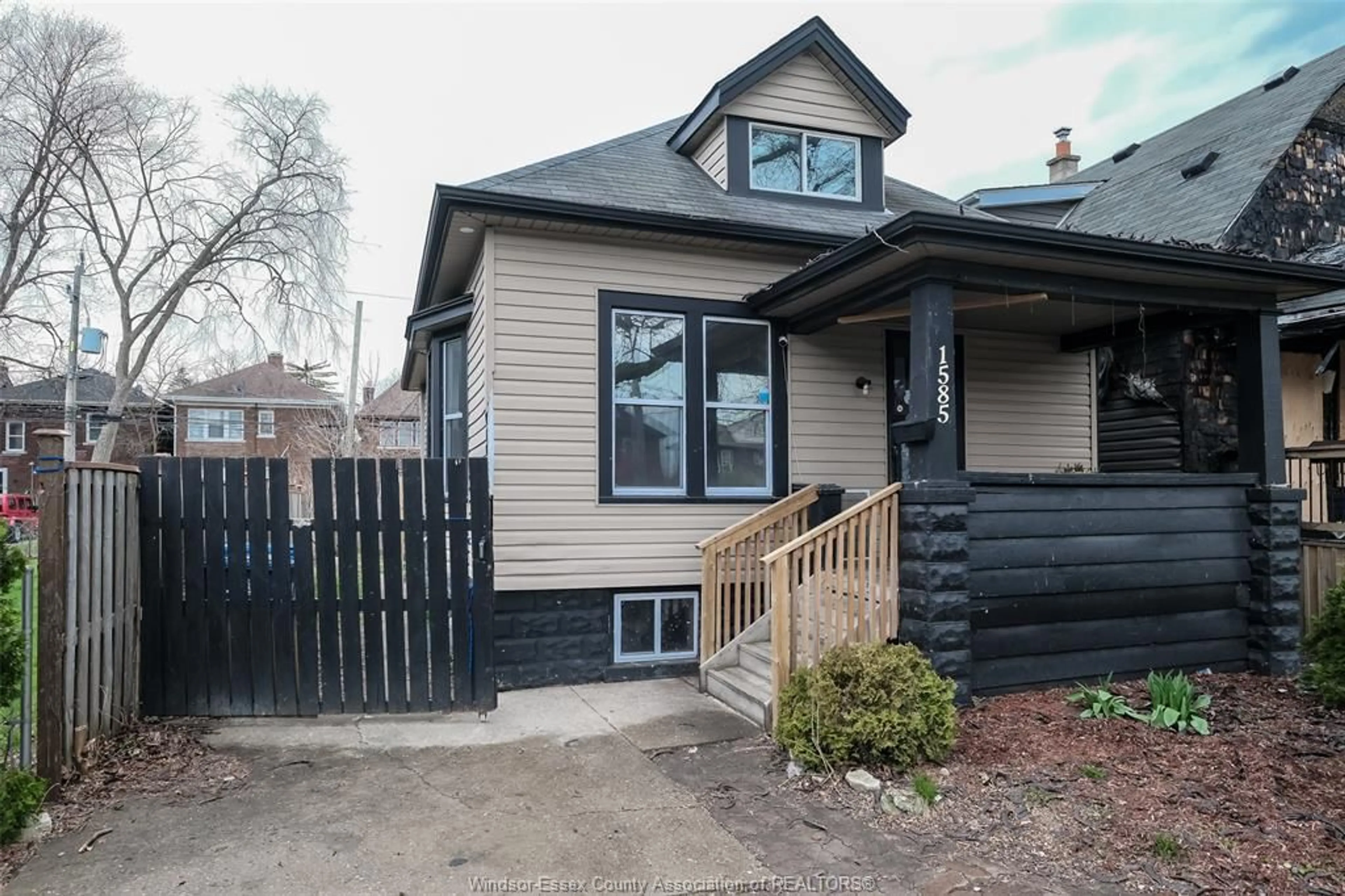 Home with vinyl exterior material, street for 1585 PELISSIER, Windsor Ontario N9X 1M9