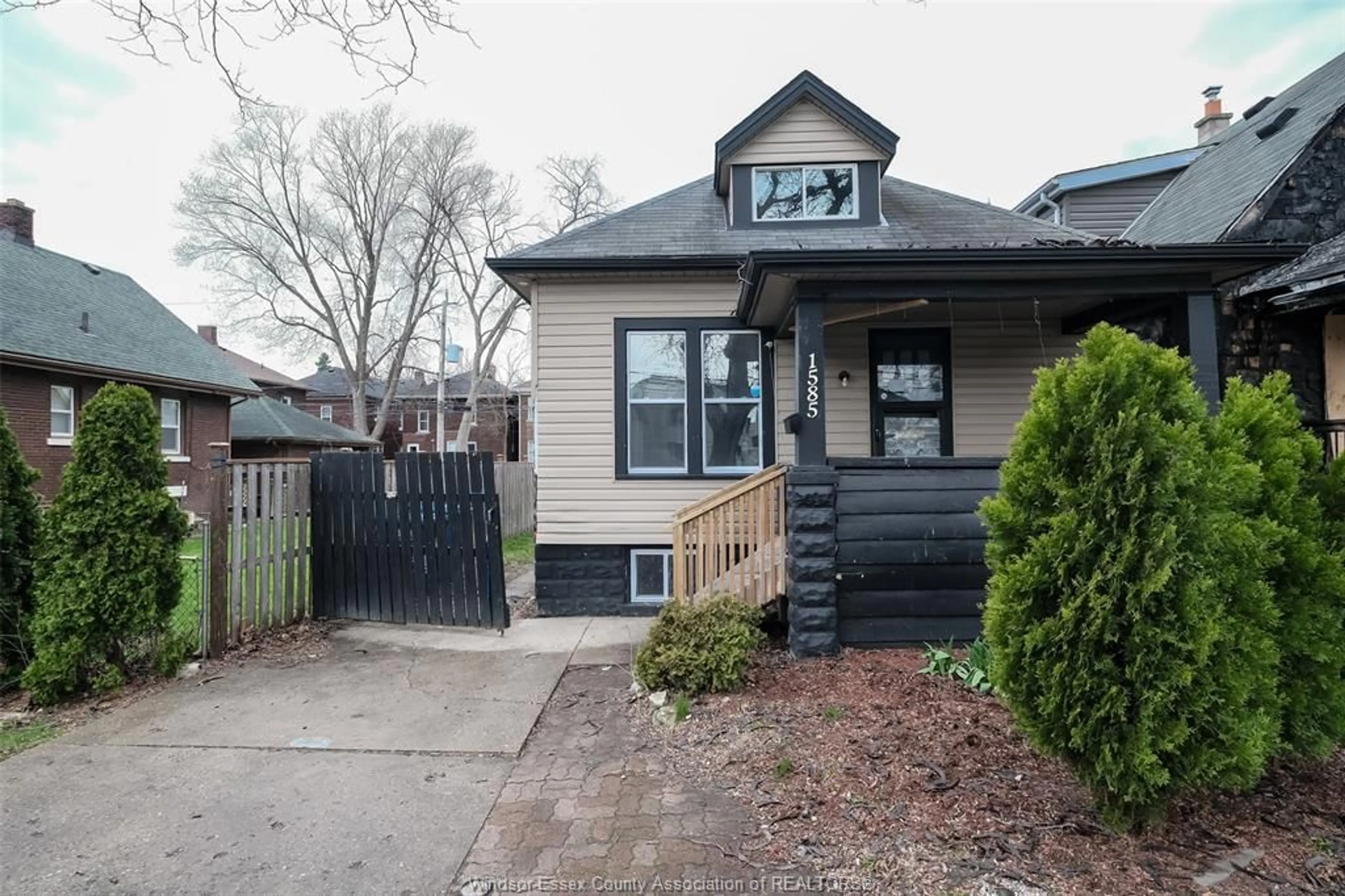 Home with vinyl exterior material, street for 1585 PELISSIER, Windsor Ontario N9X 1M9