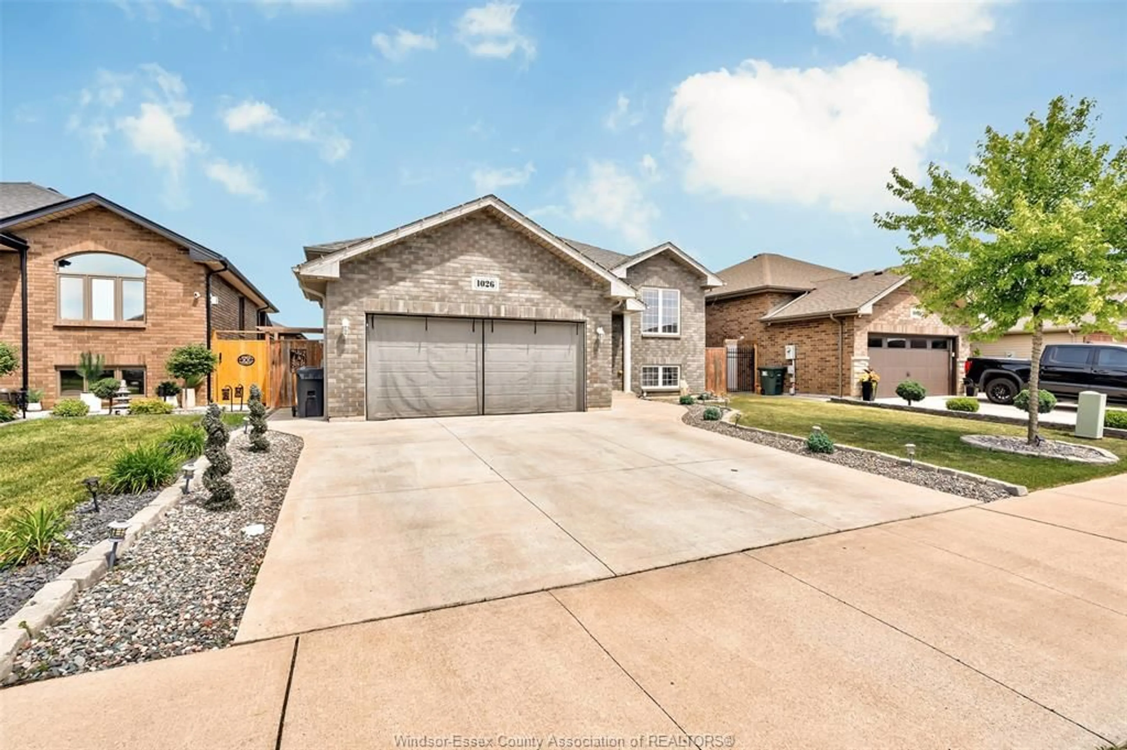 Home with brick exterior material, street for 1026 THUNDERBAY Ave, Windsor Ontario N8P 0C1