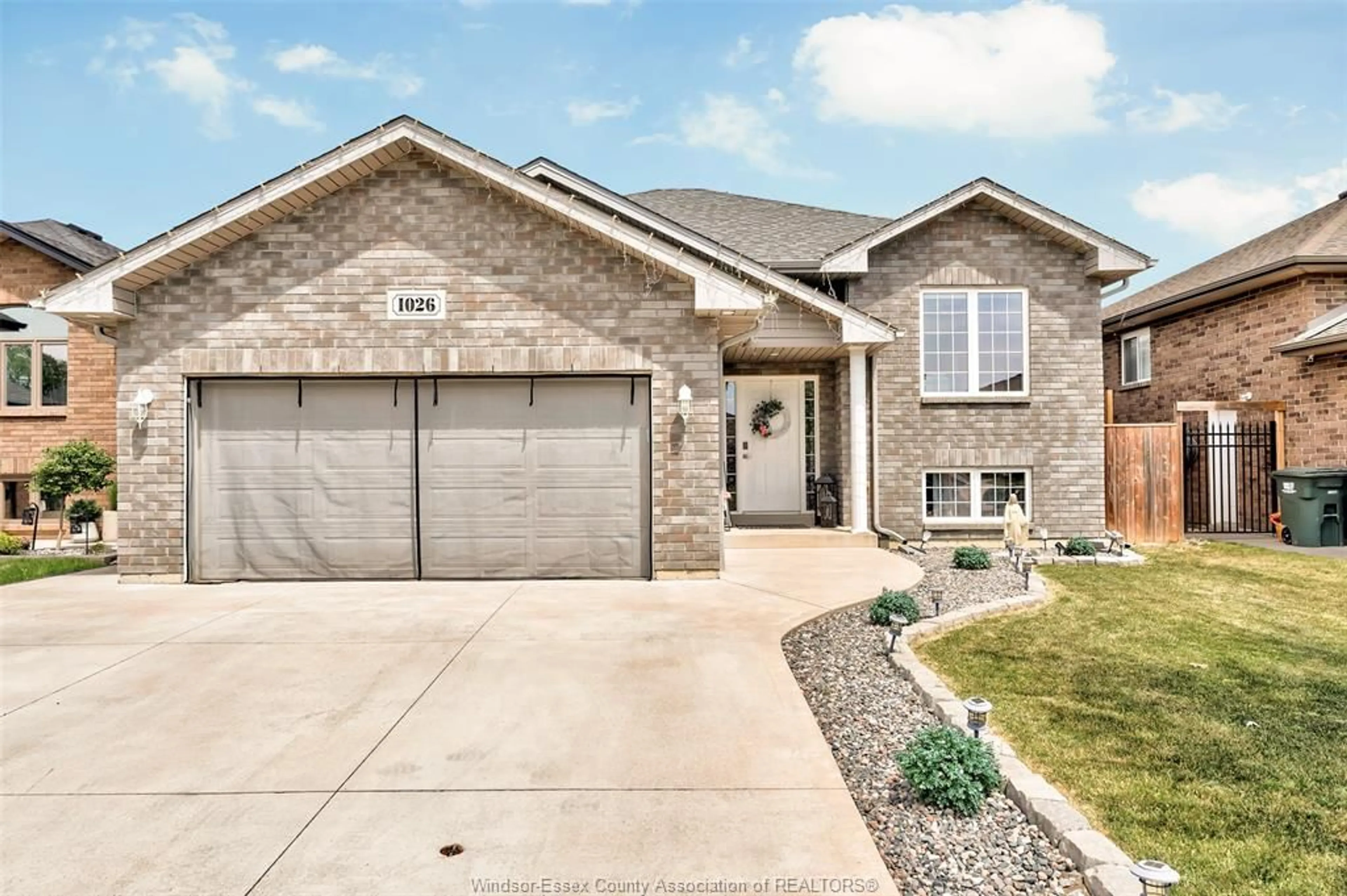 Home with brick exterior material, street for 1026 THUNDERBAY Ave, Windsor Ontario N8P 0C1