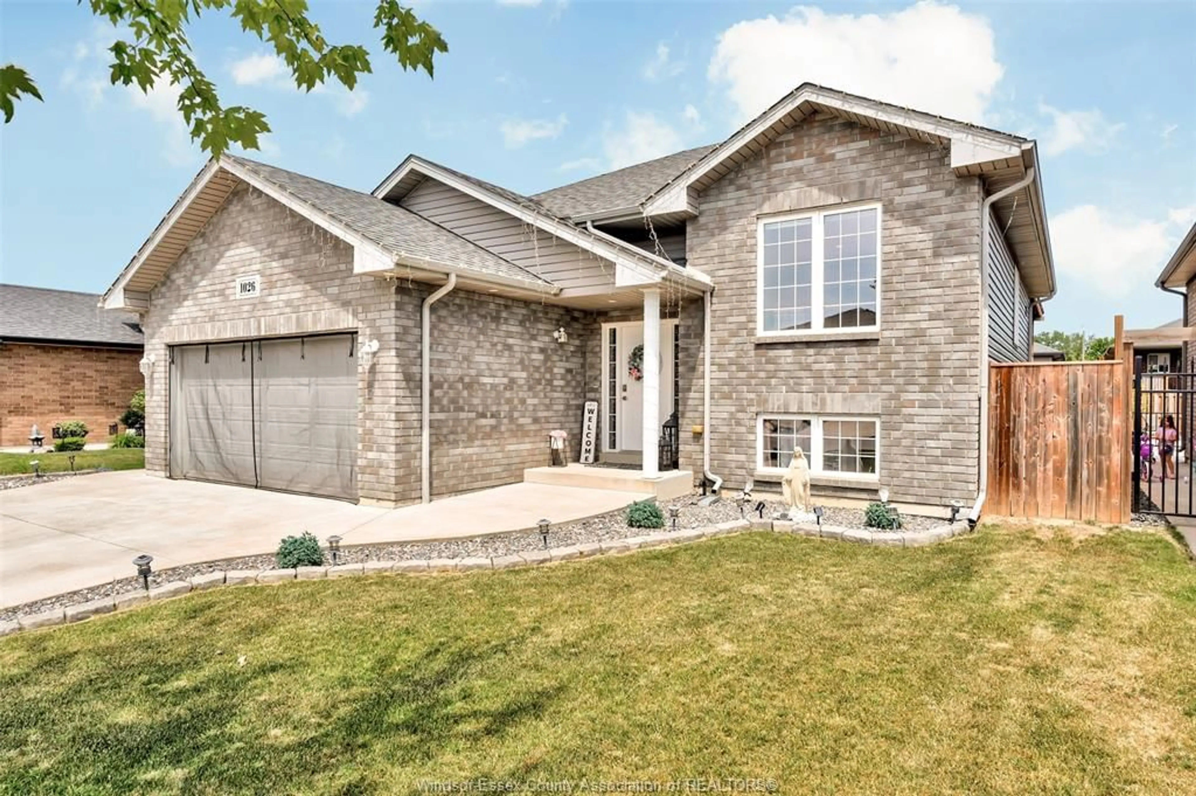 Home with brick exterior material, street for 1026 THUNDERBAY Ave, Windsor Ontario N8P 0C1
