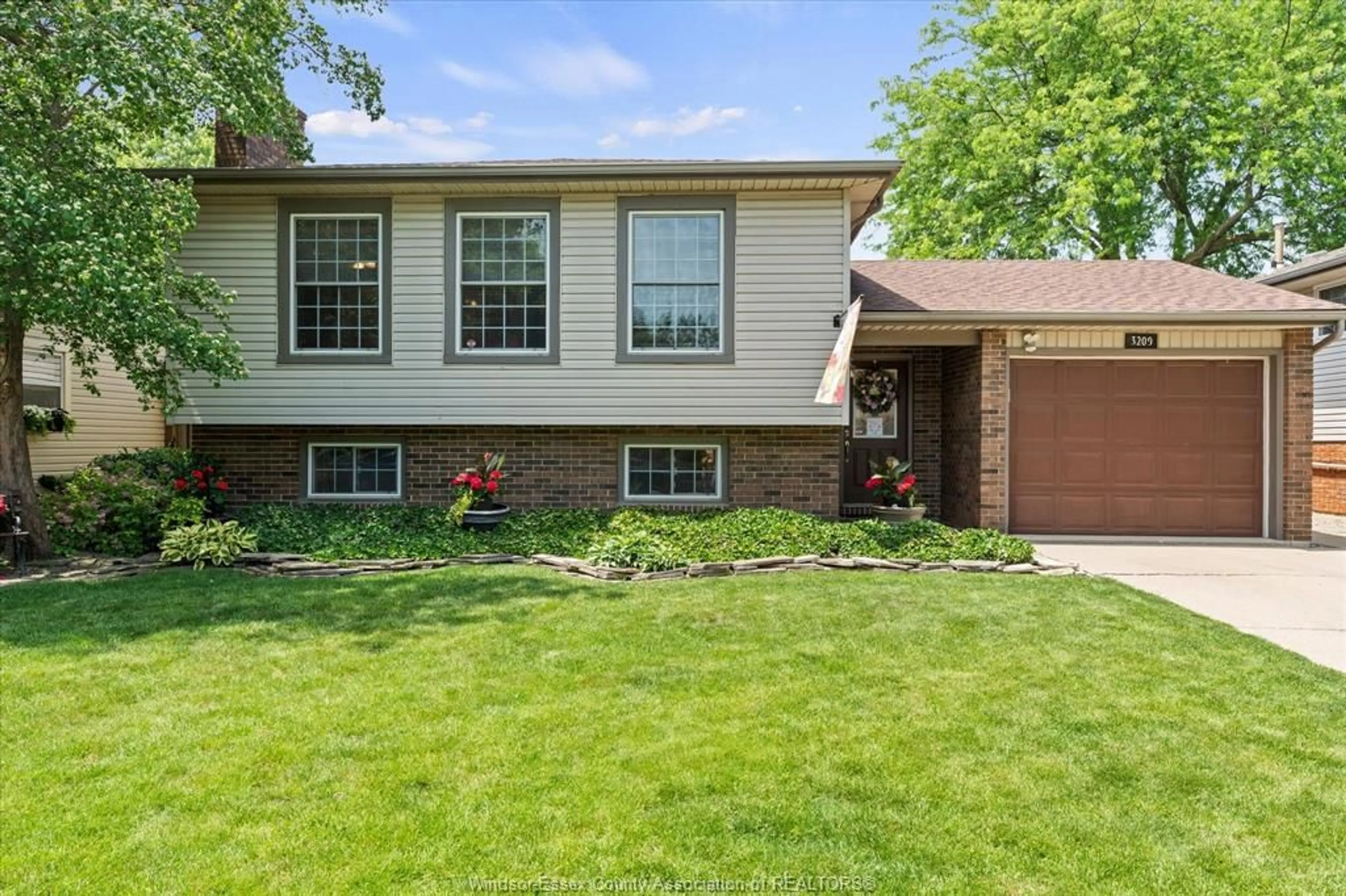 Home with brick exterior material, street for 3209 Halpin, Windsor Ontario N8R 2B3