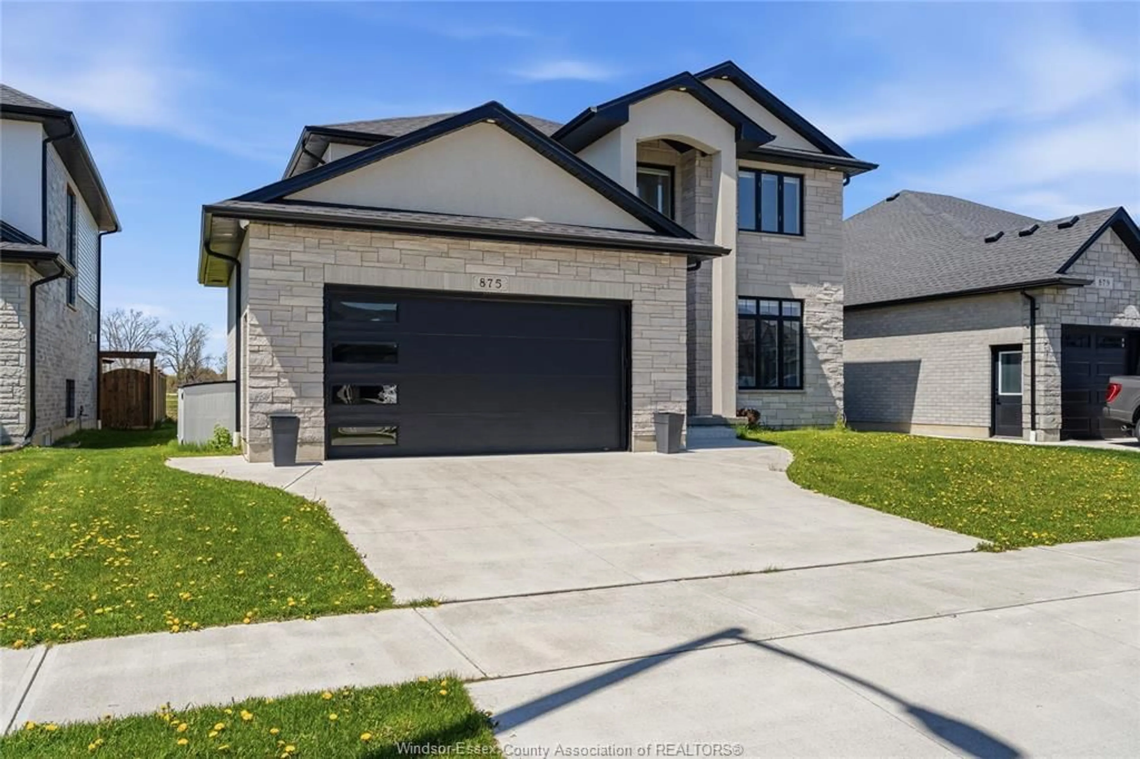 Home with brick exterior material, street for 875 MAGNOLIA Lane, Sarnia Ontario N7S 0G3