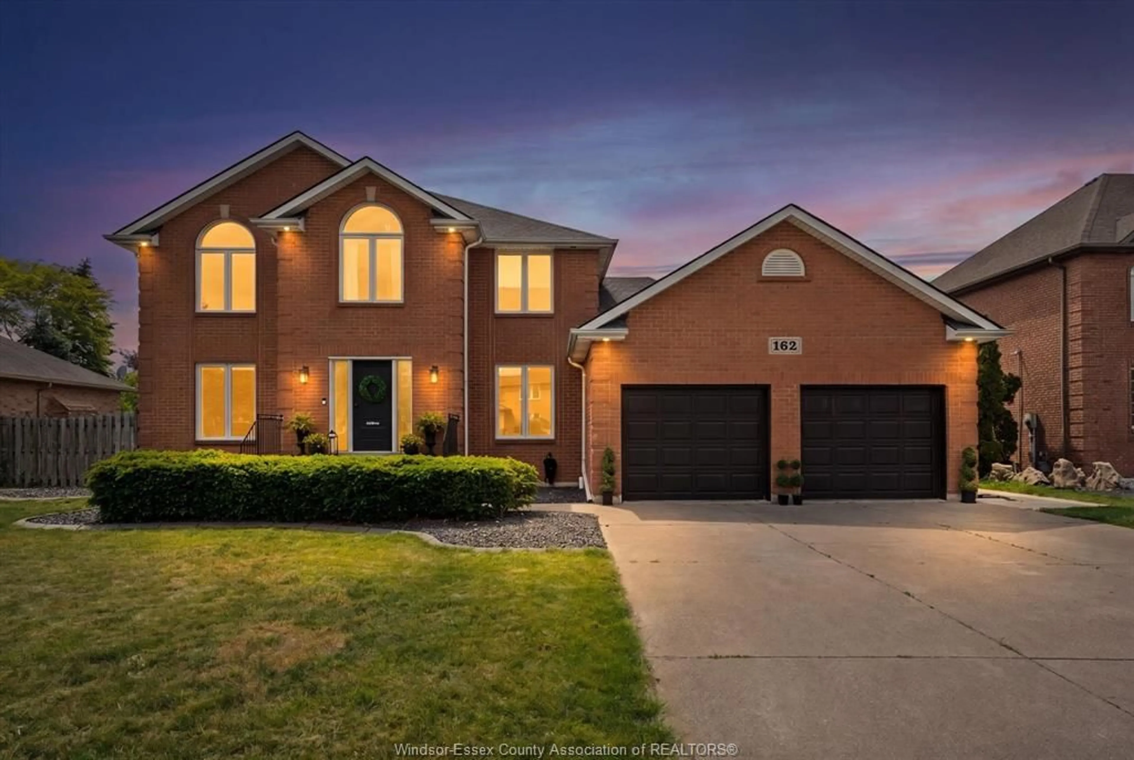 Home with brick exterior material, street for 162 MARTIN Dr, Lakeshore Ontario N8L 0Z6