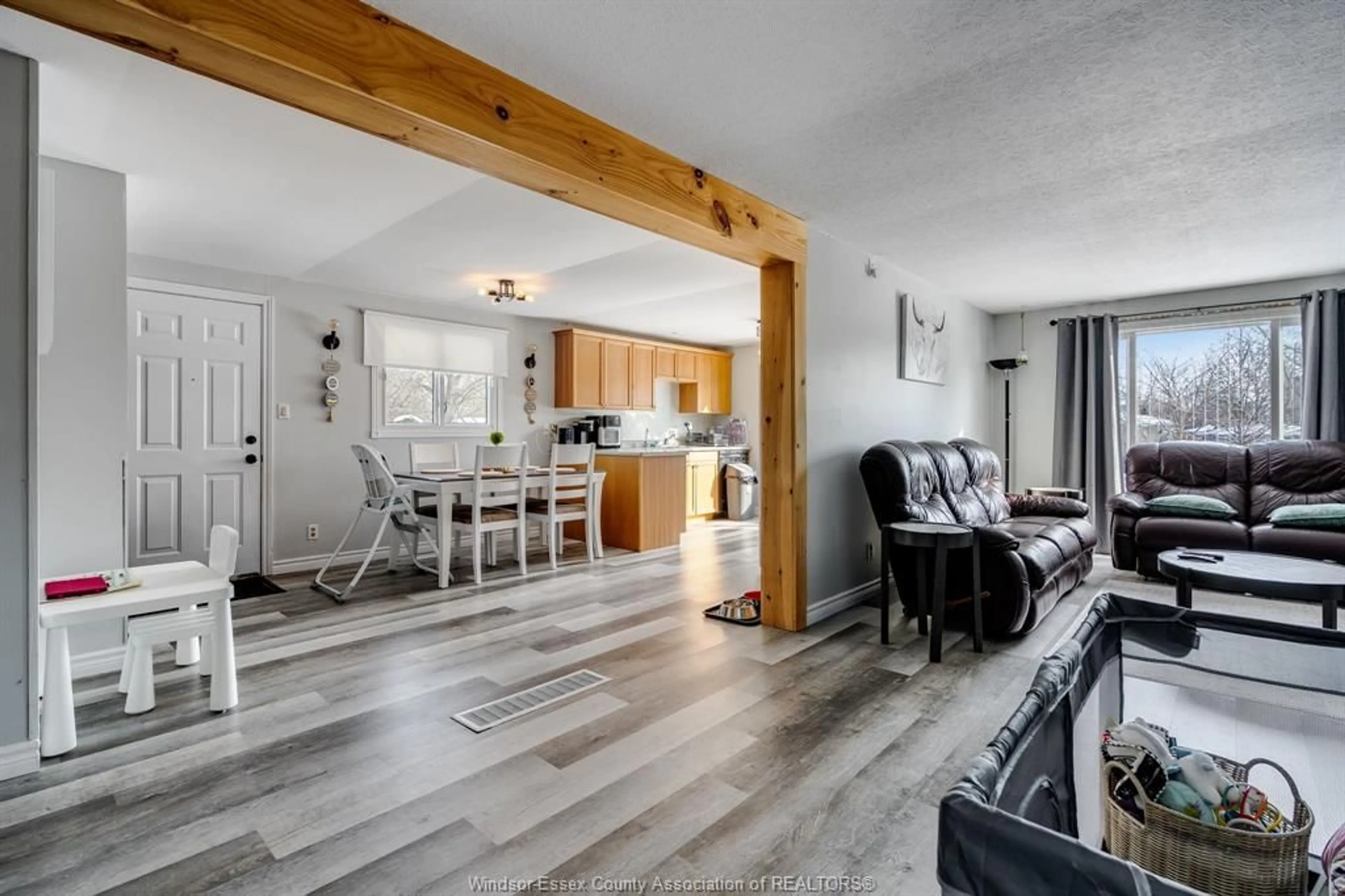 Open concept kitchen, wood/laminate floor for 302 Summerset Ave, Kingsville Ontario N9Y 2B9