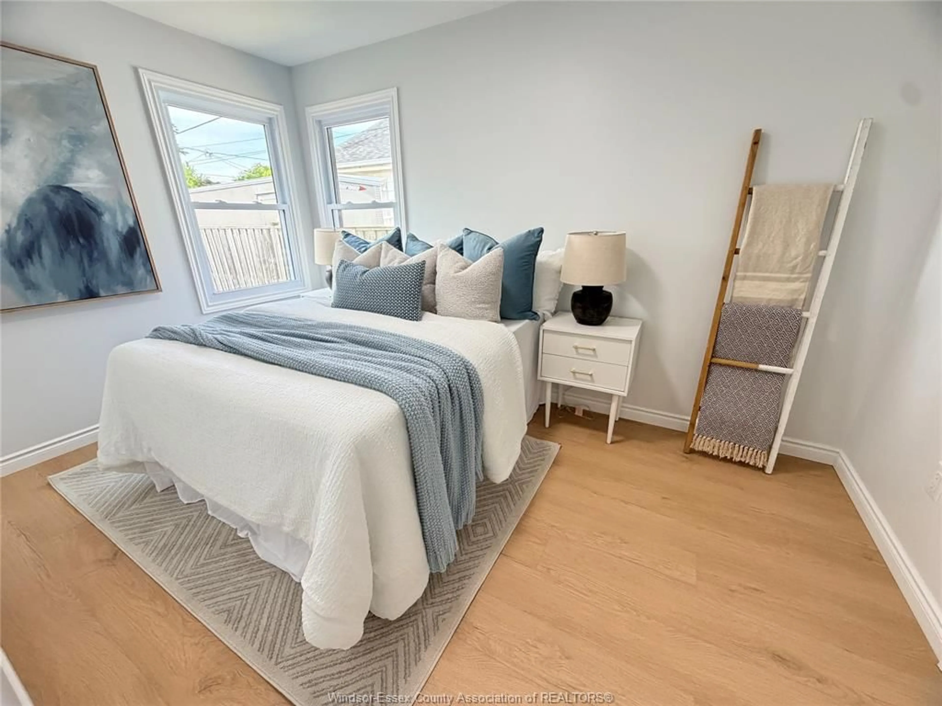 Bedroom with bed, wood/laminate floor for 1651 AUBIN Rd, Windsor Ontario N8Y 4G3