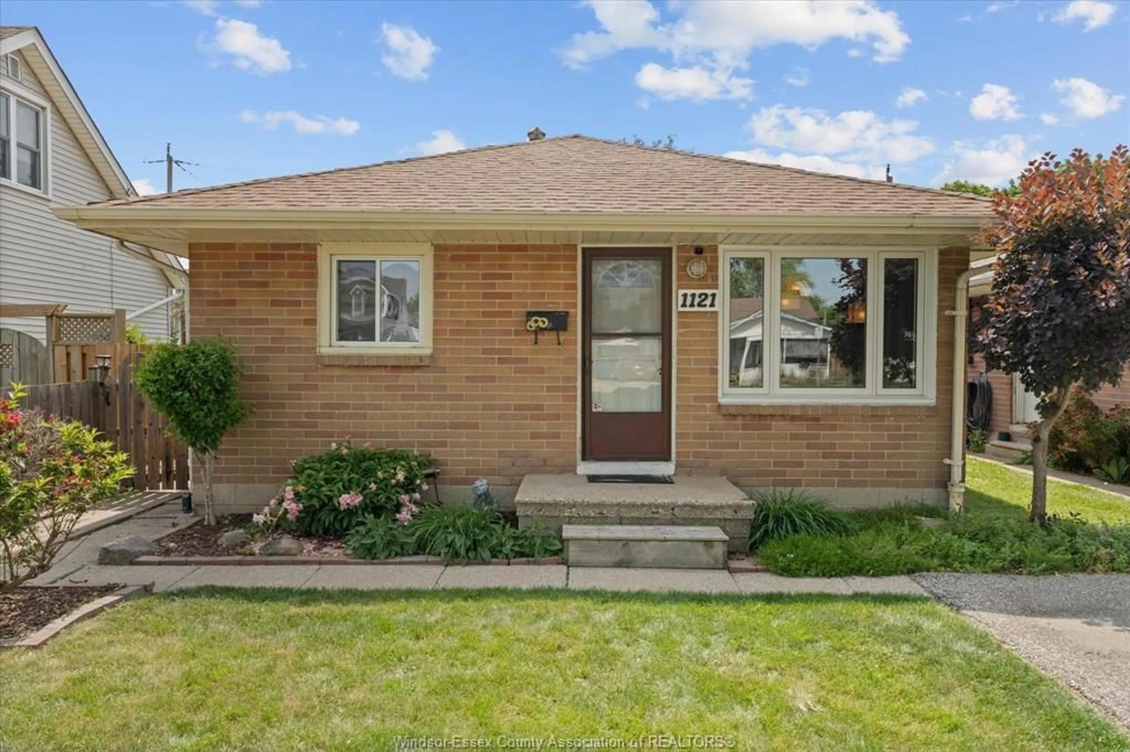 Home with brick exterior material, street for 1121 PARTINGTON, Windsor Ontario N9B 2P3