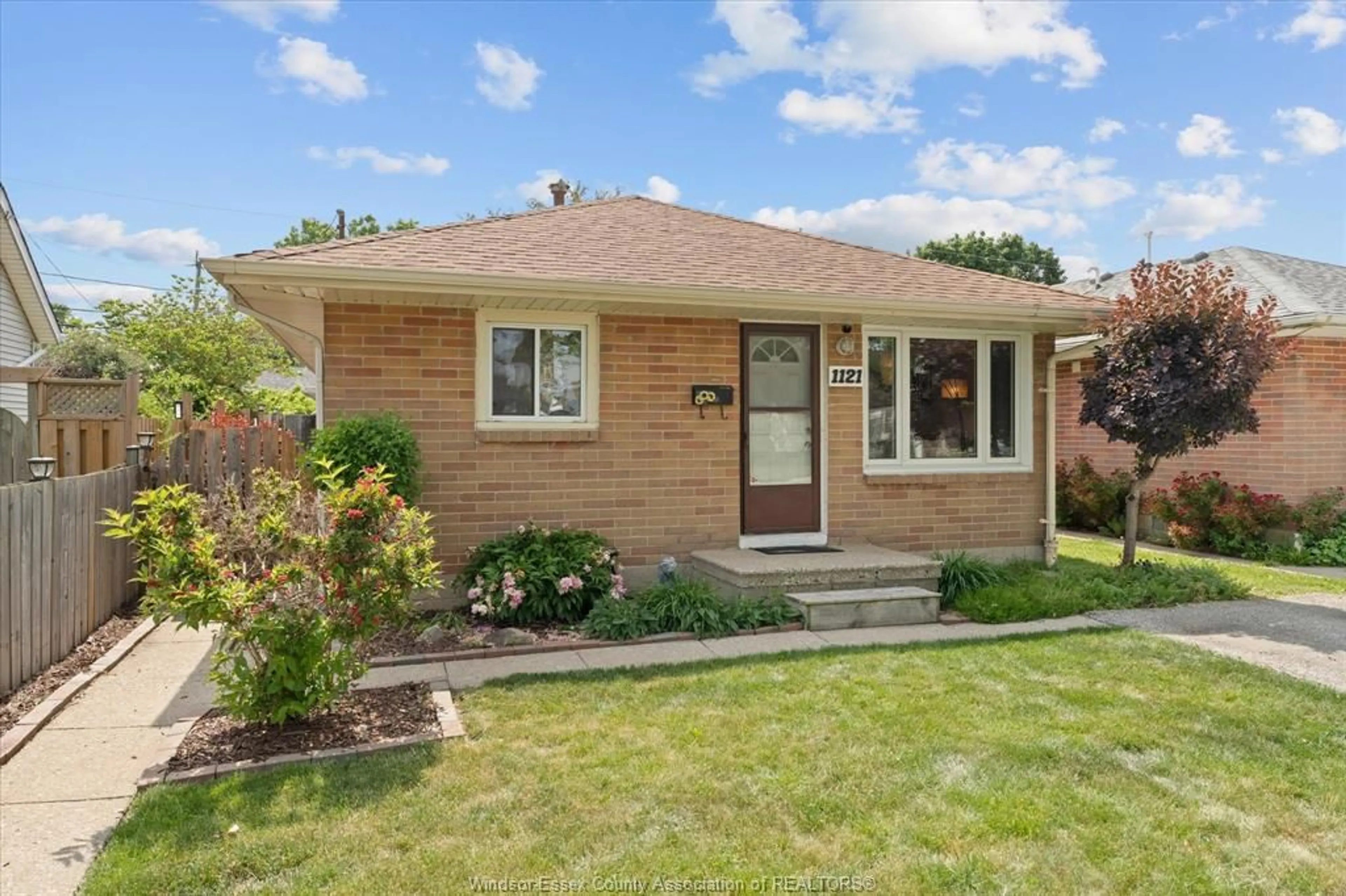 Home with brick exterior material, street for 1121 PARTINGTON, Windsor Ontario N9B 2P3