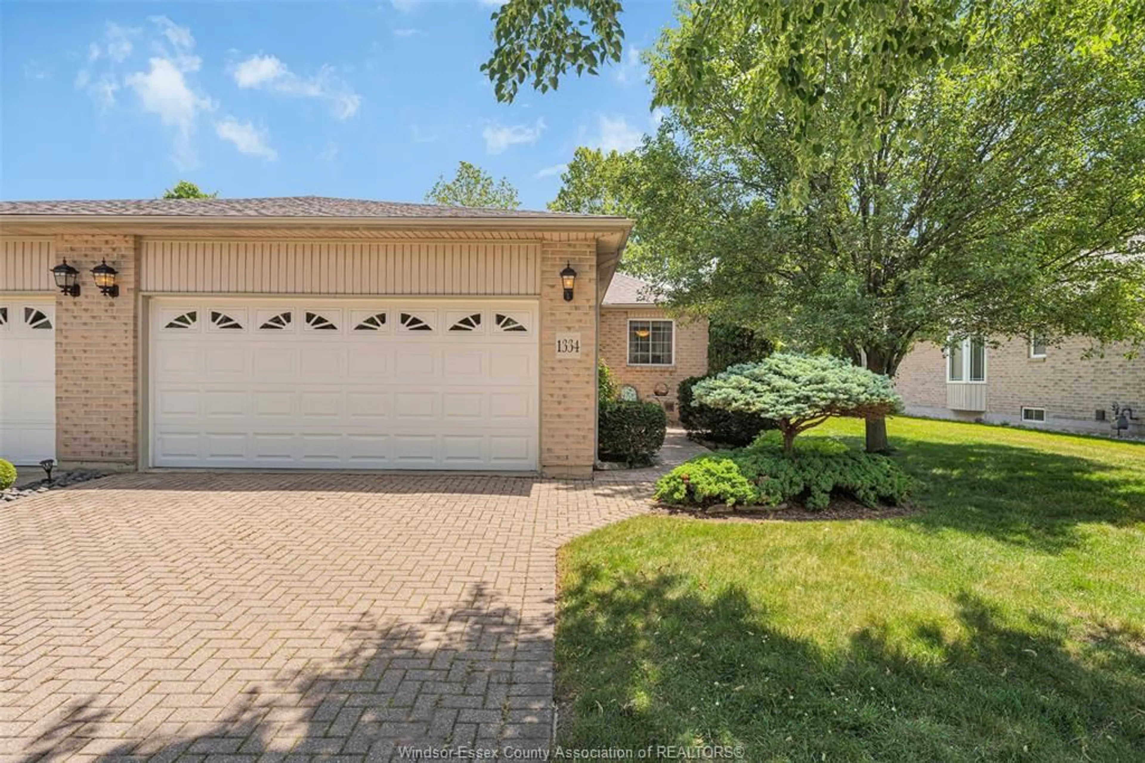 Home with brick exterior material, street for 1334 RENDEZVOUS Dr, Windsor Ontario N8P 1K7