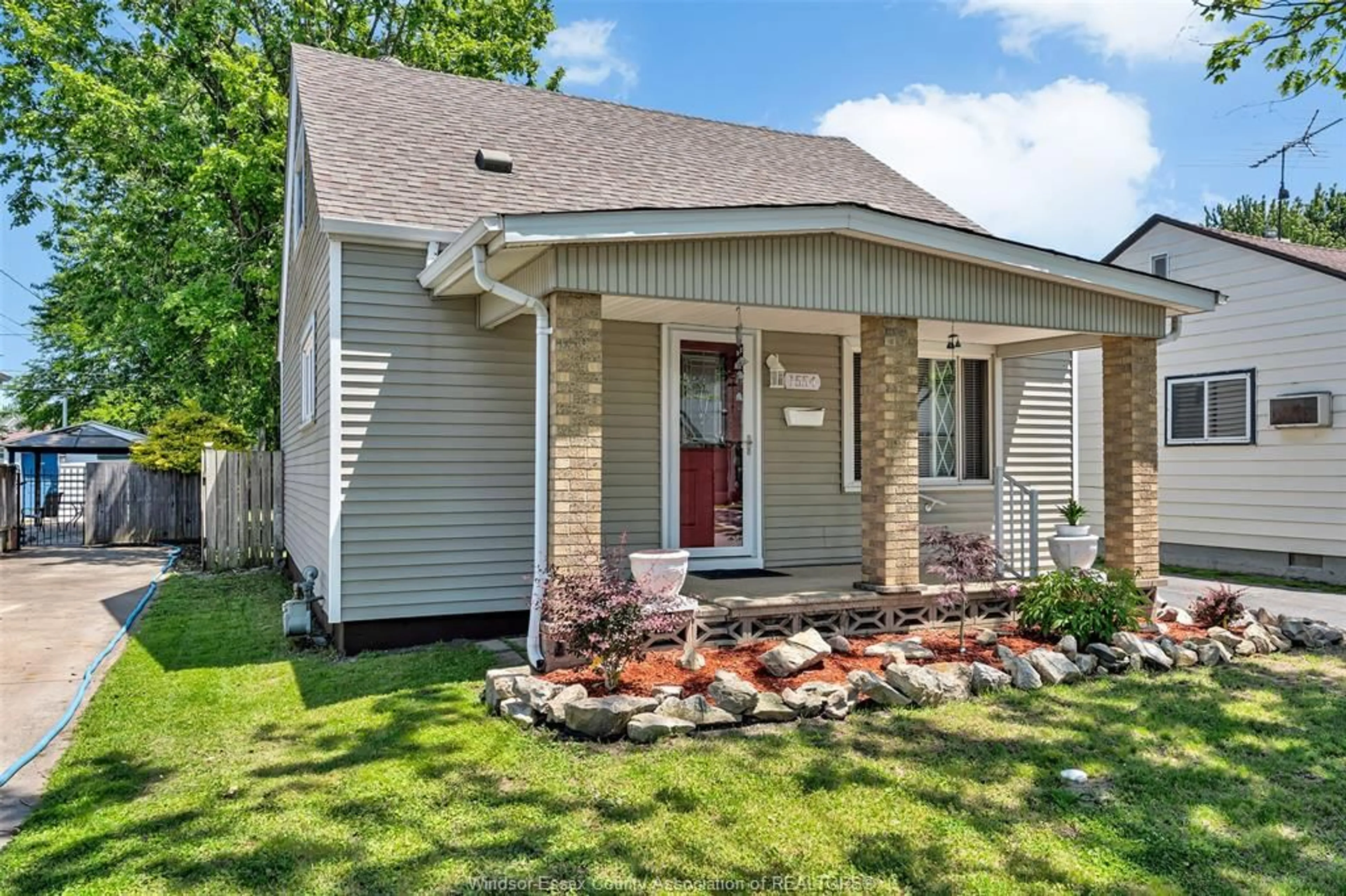 Home with vinyl exterior material, street for 1554 AUBIN Rd, Windsor Ontario N8Y 4G2