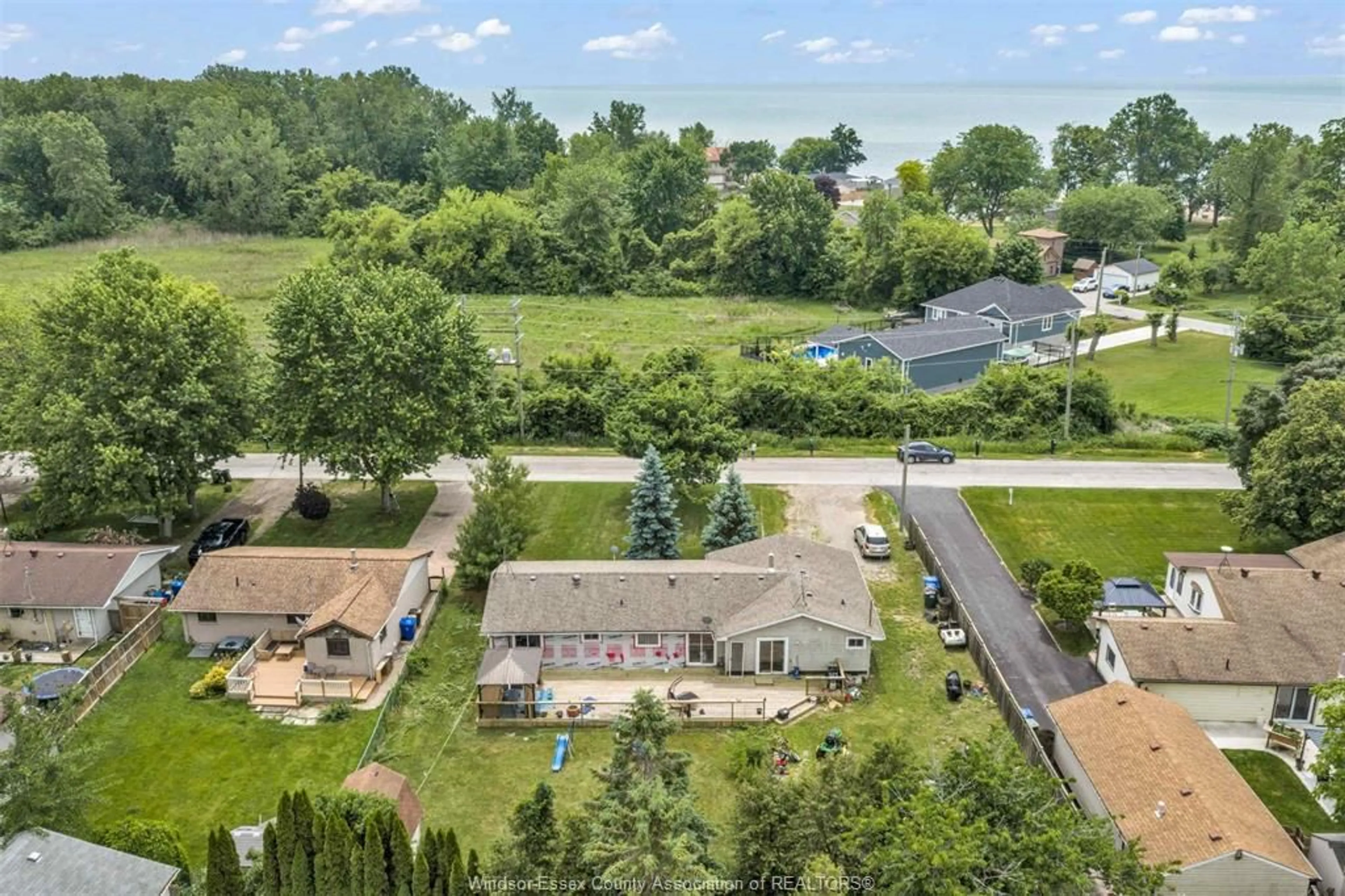 A pic from outside/outdoor area/front of a property/back of a property/a pic from drone, water/lake/river/ocean view for 126 McLeod, Amherstburg Ontario N9V 2Y8
