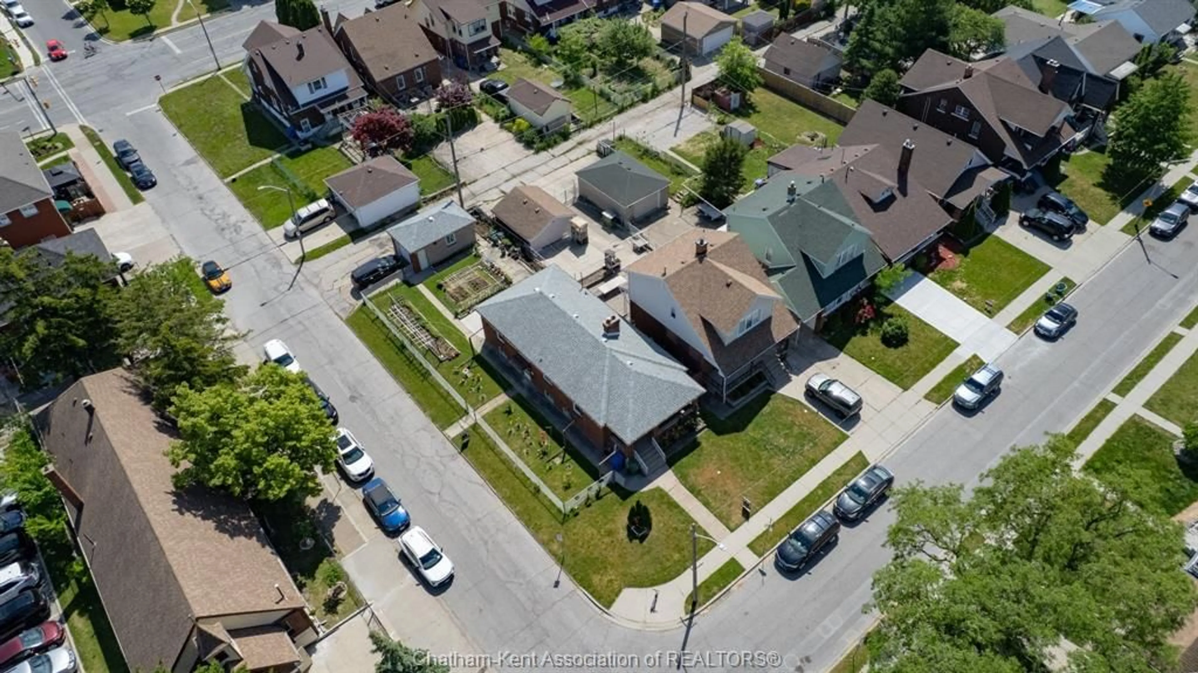 A pic from outside/outdoor area/front of a property/back of a property/a pic from drone, street for 1402 Elsmere Ave, Windsor Ontario N8X 4G9