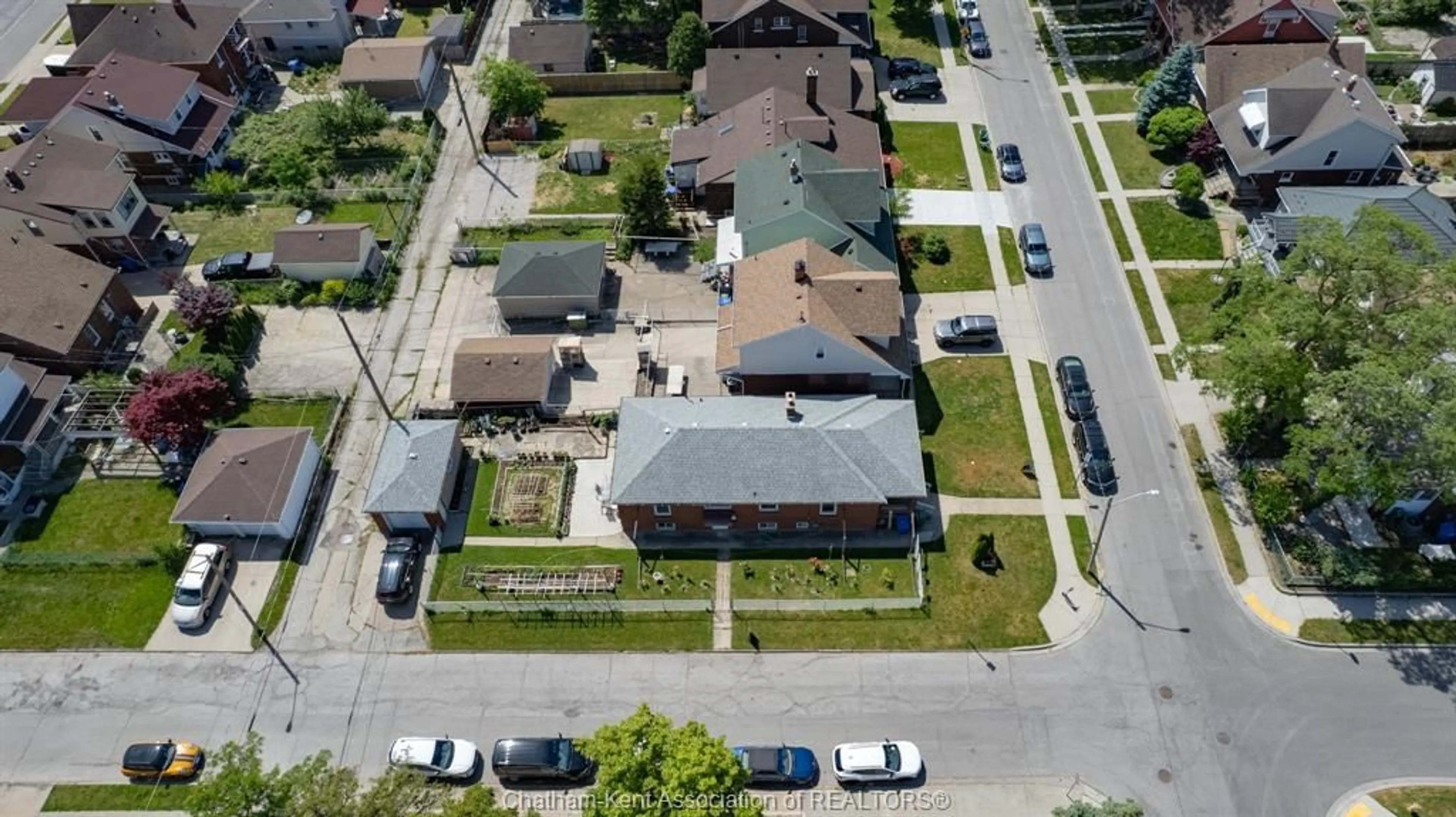 A pic from outside/outdoor area/front of a property/back of a property/a pic from drone, street for 1402 Elsmere Ave, Windsor Ontario N8X 4G9