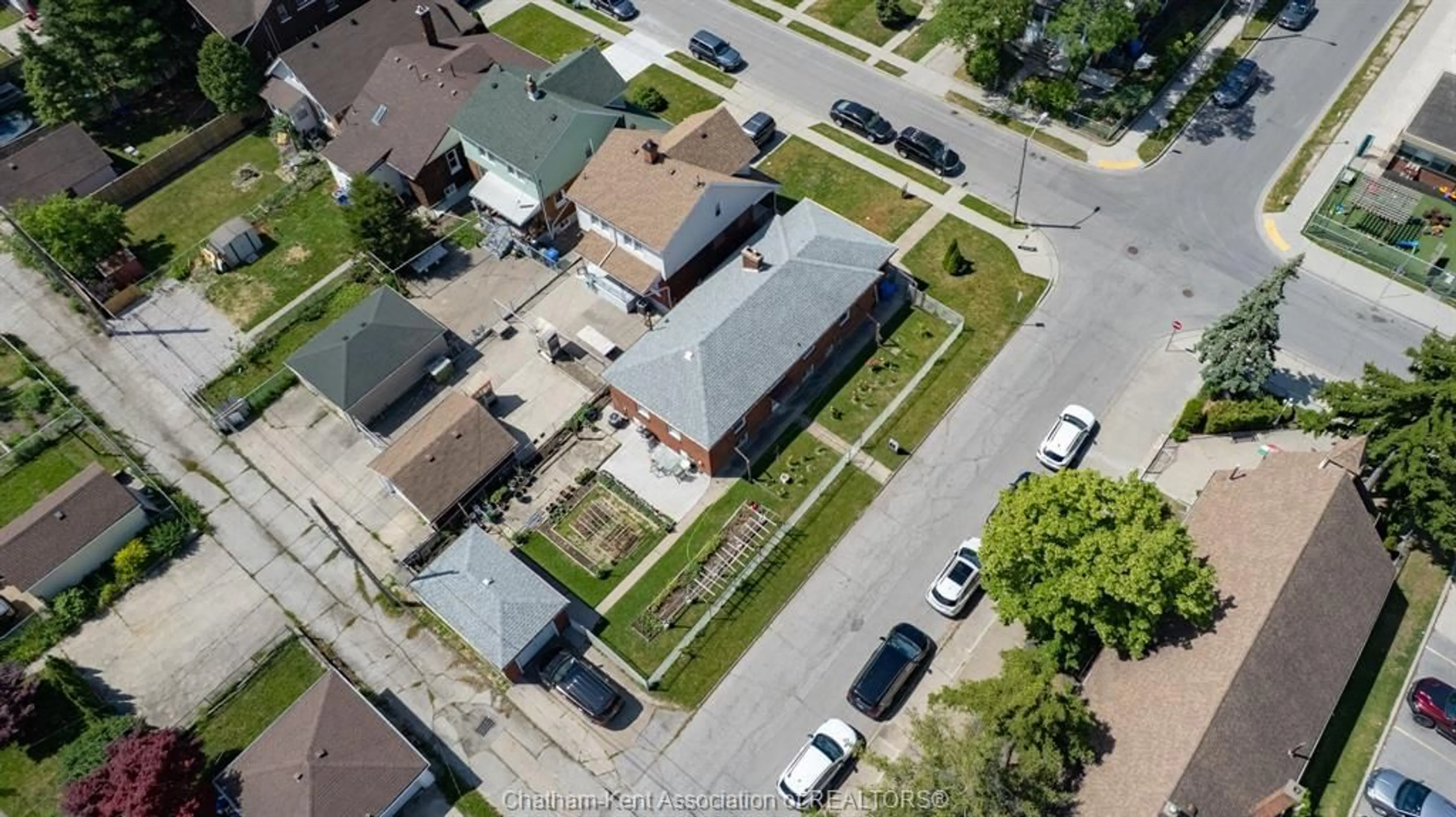 A pic from outside/outdoor area/front of a property/back of a property/a pic from drone, street for 1402 Elsmere Ave, Windsor Ontario N8X 4G9