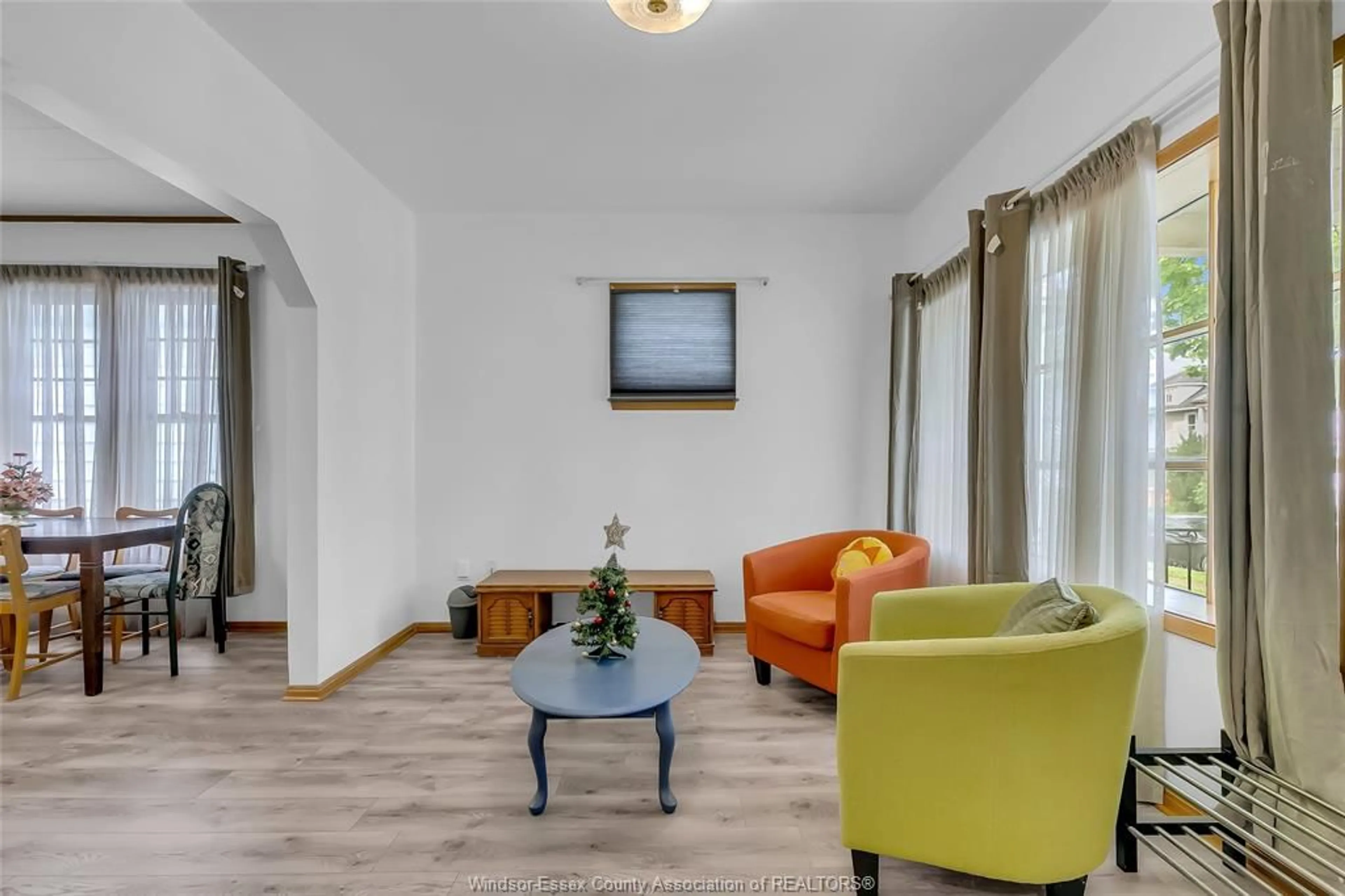 Living room with furniture, wood/laminate floor for 383 MCEWAN, Windsor Ontario N9B 2E5