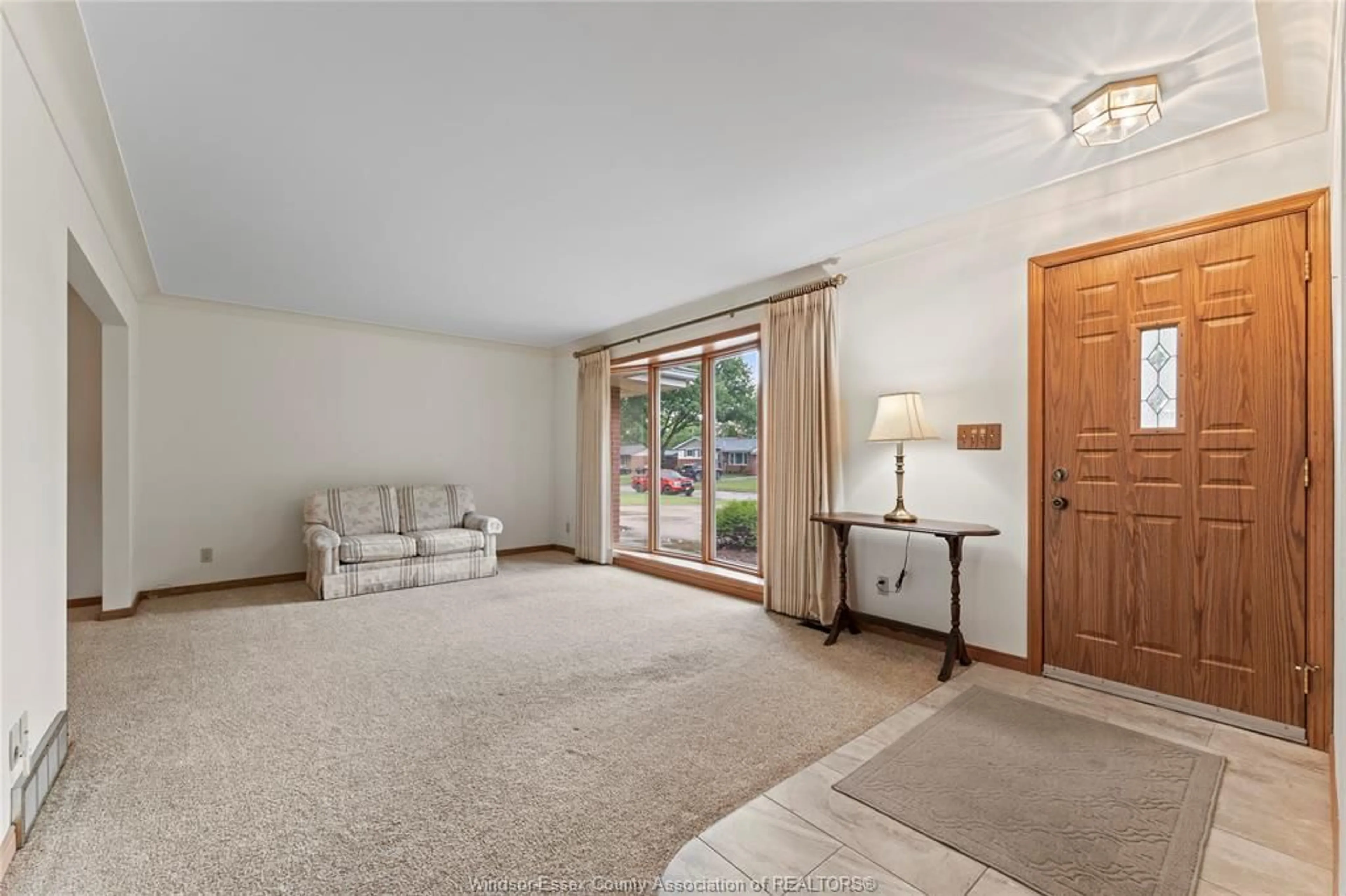 Living room with furniture, carpet floor for 771 Bedford St, Windsor Ontario N9G 1H3
