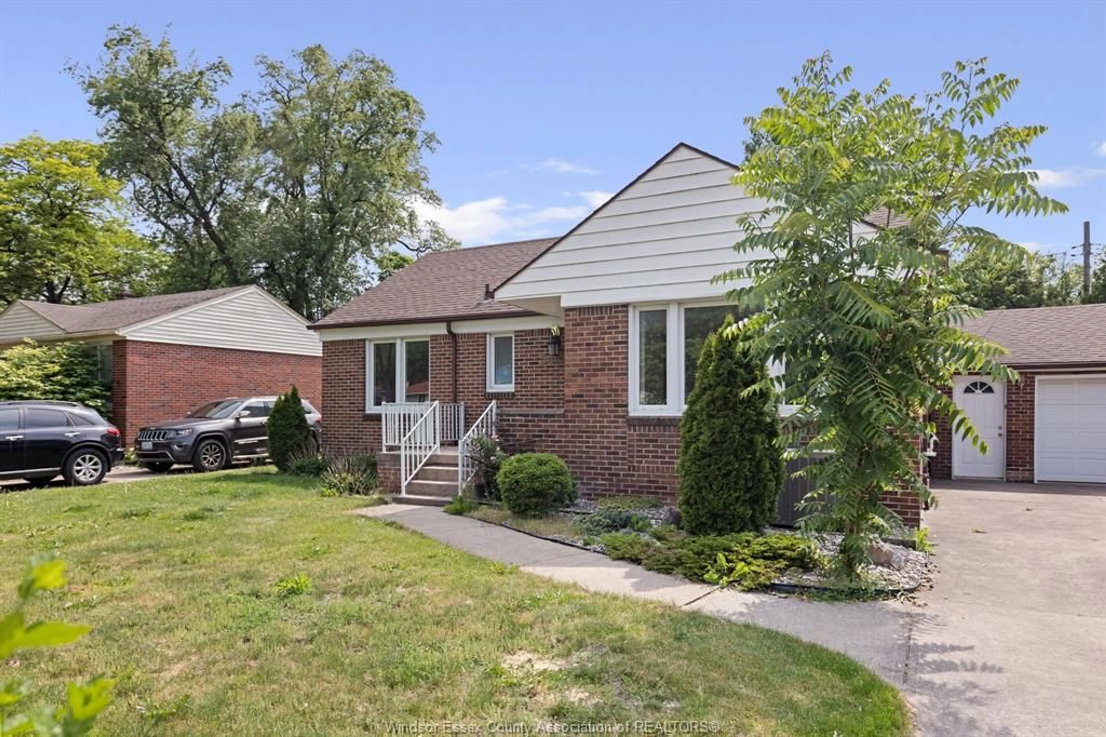 Home with brick exterior material, street for 3455 DOUGALL, Windsor Ontario N9E 1S9