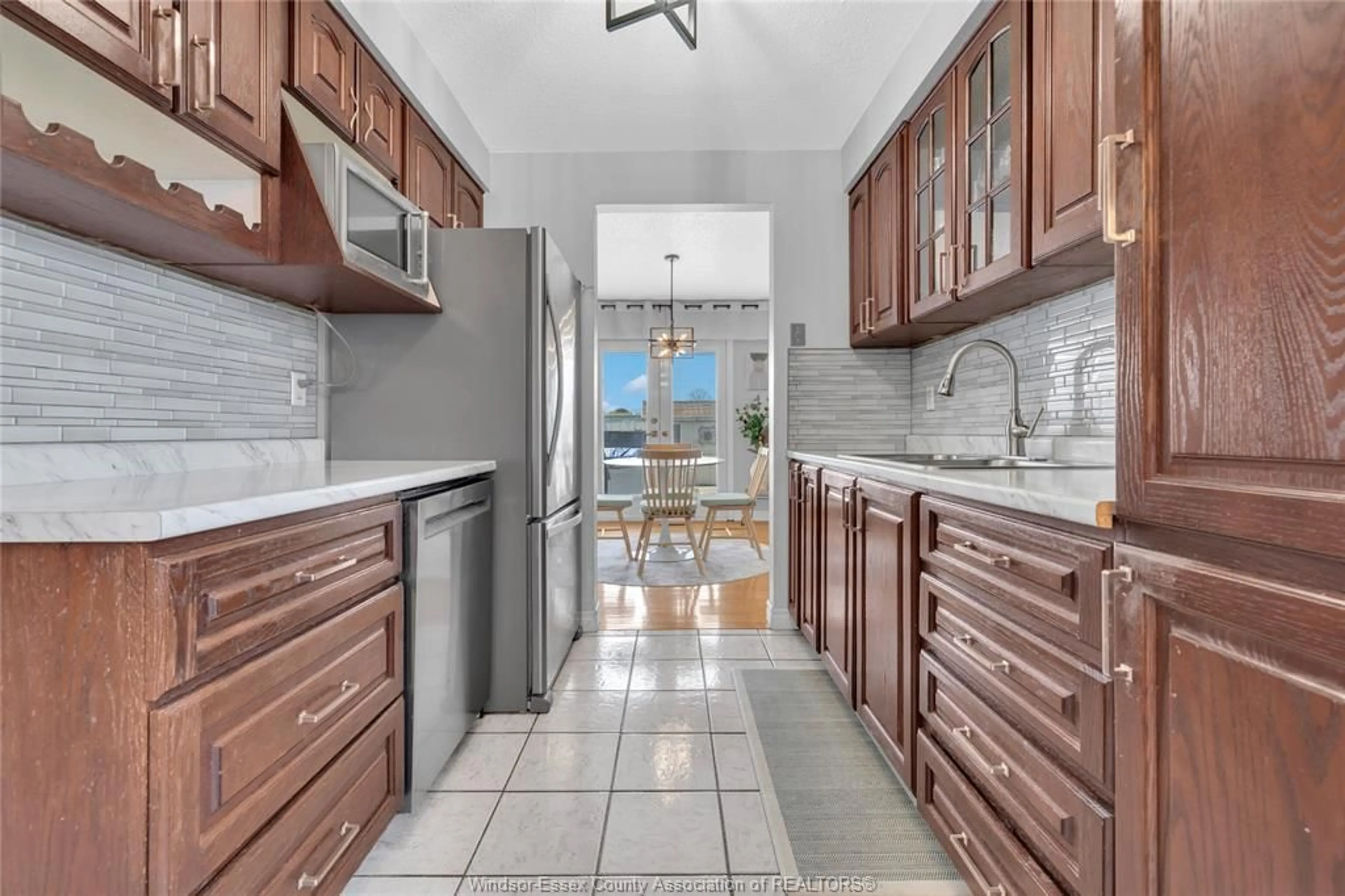 Open concept kitchen, ceramic/tile floor for 3009 SUFFOLK St, Windsor Ontario N8R 1P1