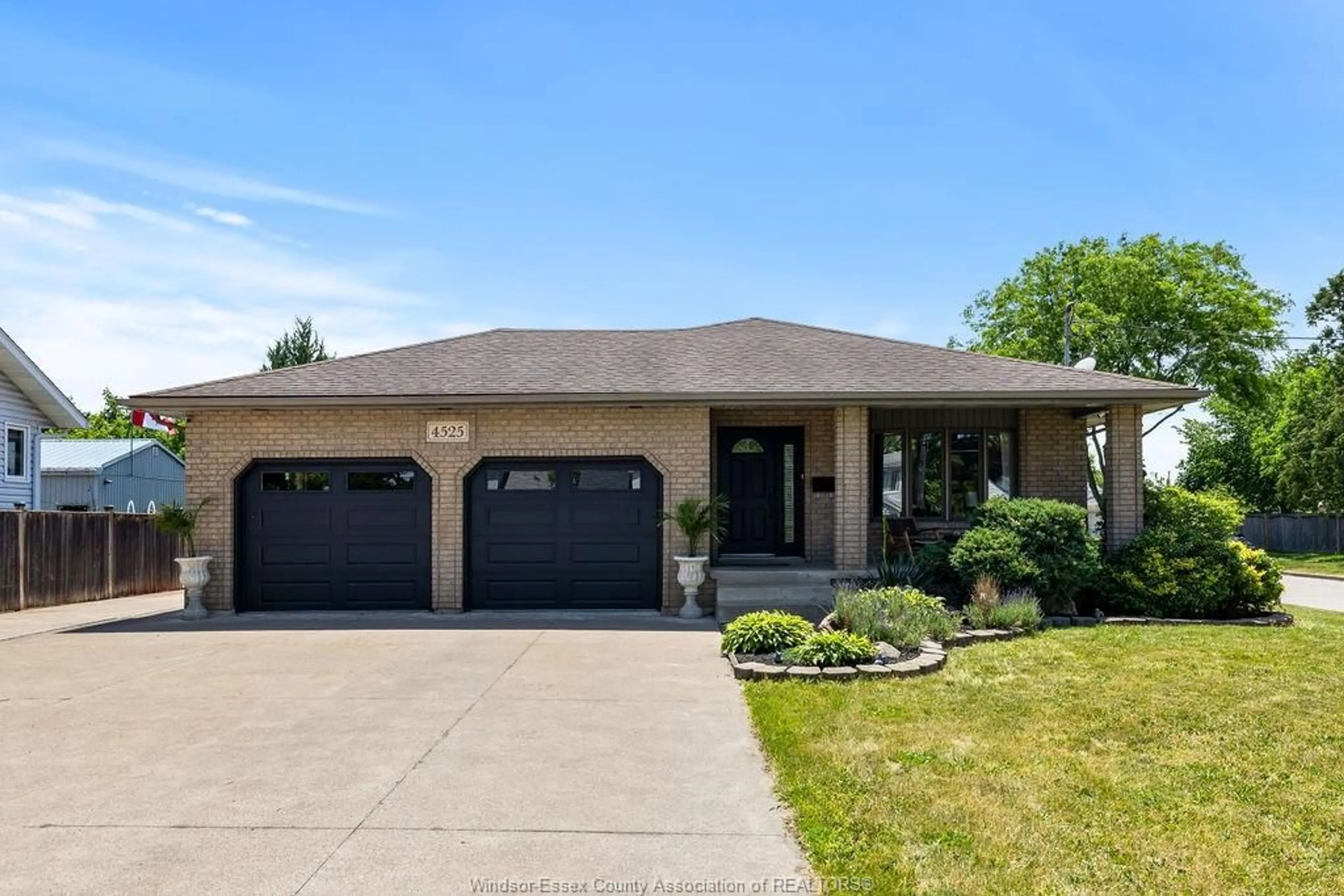 Home with brick exterior material, street for 4525 GRAND MARAIS RD E, Windsor Ontario N8W 1X5