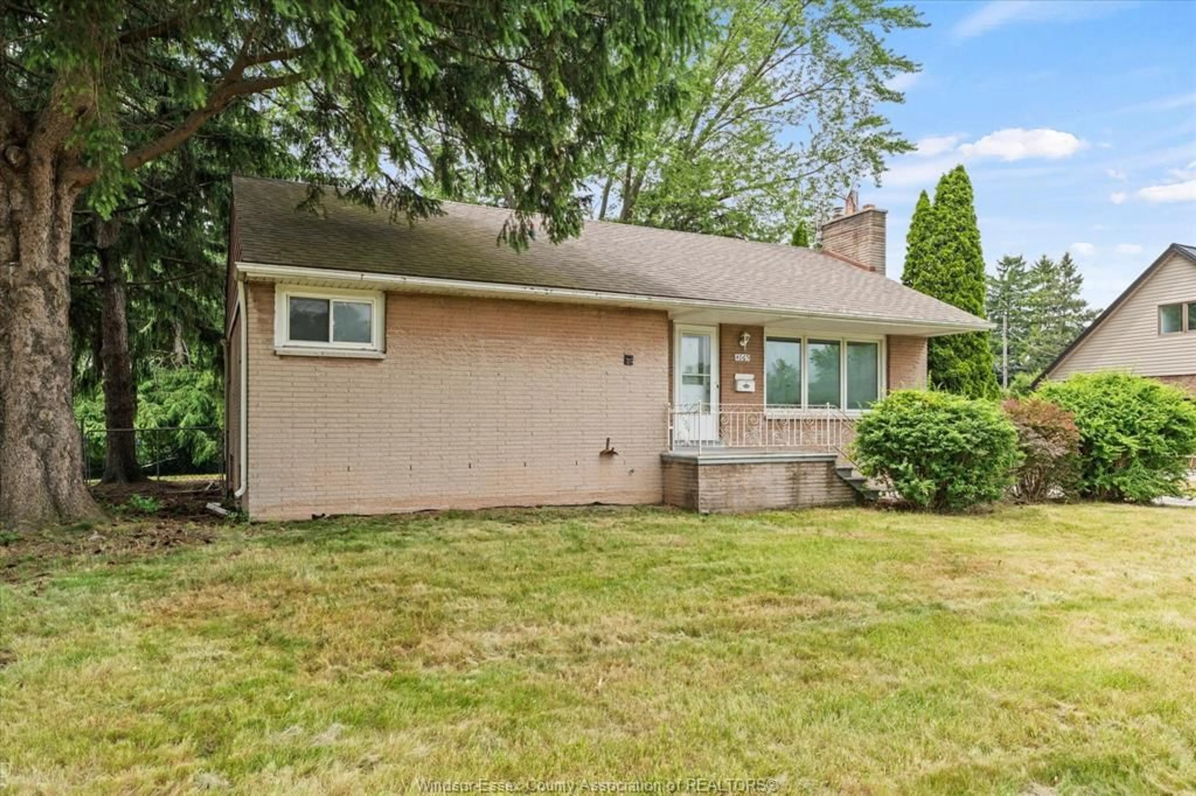 Home with vinyl exterior material, street for 4065 Dougall, Windsor Ontario N9G 1X4