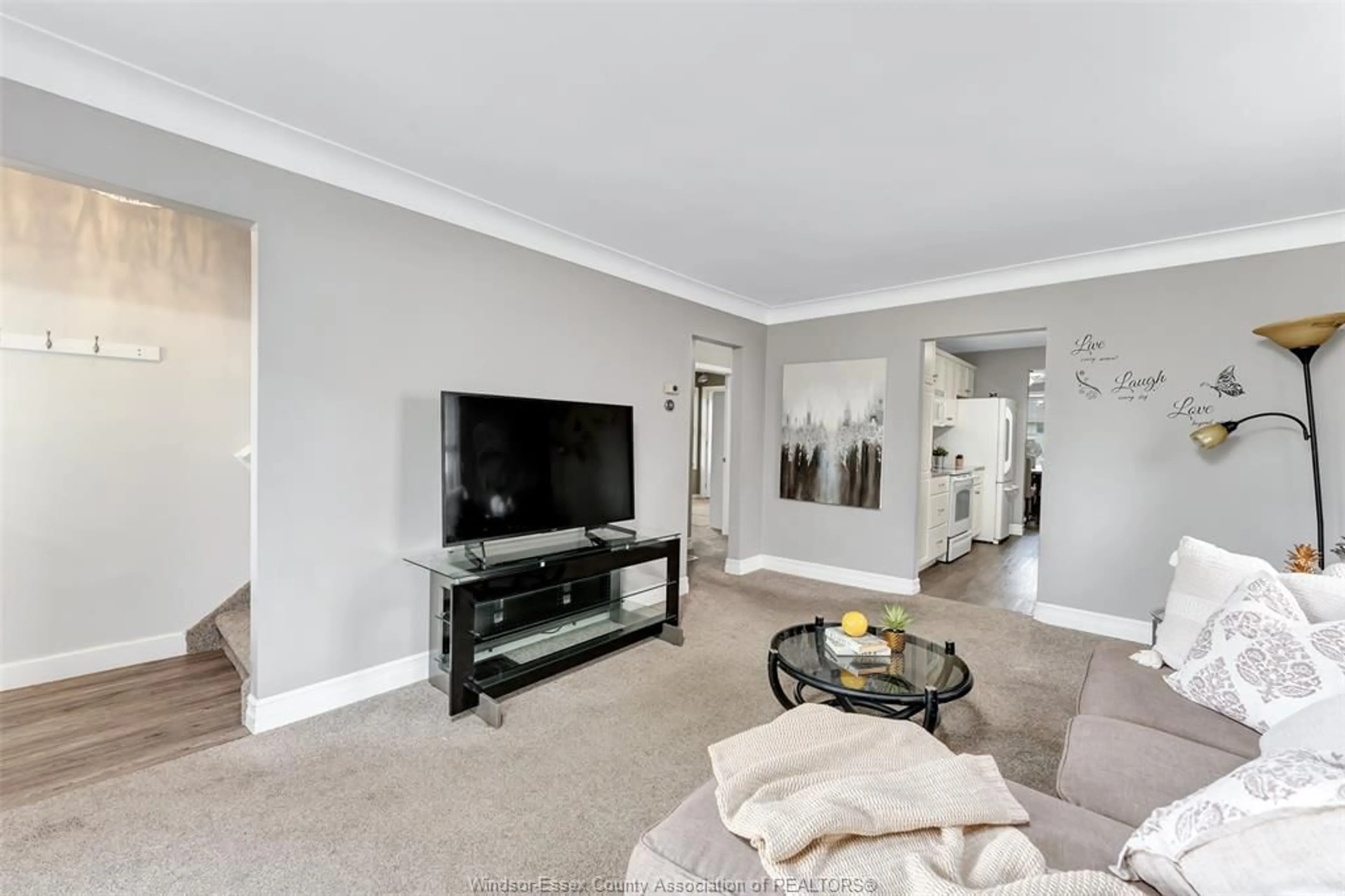Living room with furniture, carpet floor for 1857 CENTRAL Ave, Windsor Ontario N8W 4H6