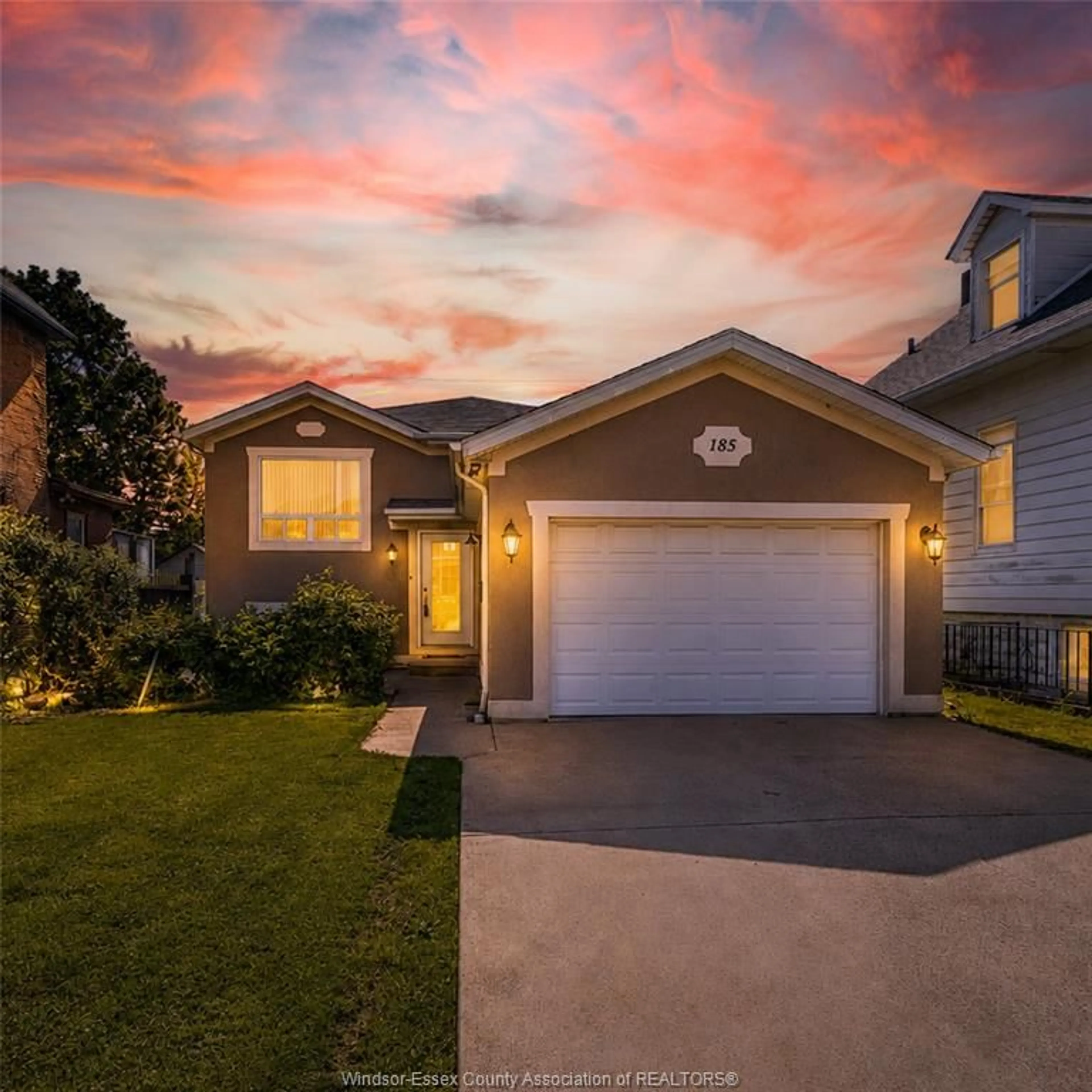 Home with vinyl exterior material, street for 185 ELM Ave, Windsor Ontario N9A 5G9