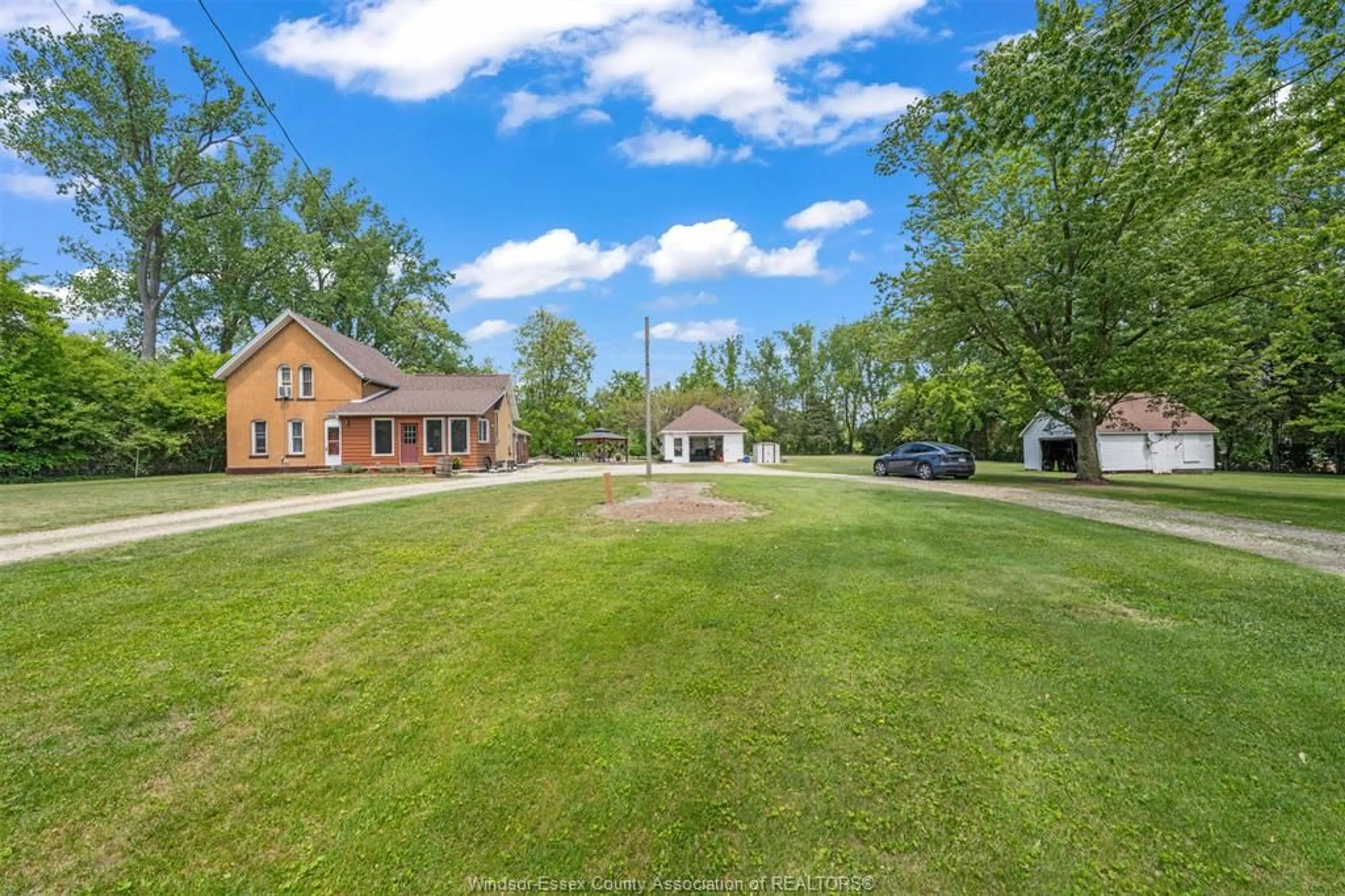 A pic from outside/outdoor area/front of a property/back of a property/a pic from drone, water/lake/river/ocean view for 125 Mersea Rd 5, Leamington Ontario N8H 3V5