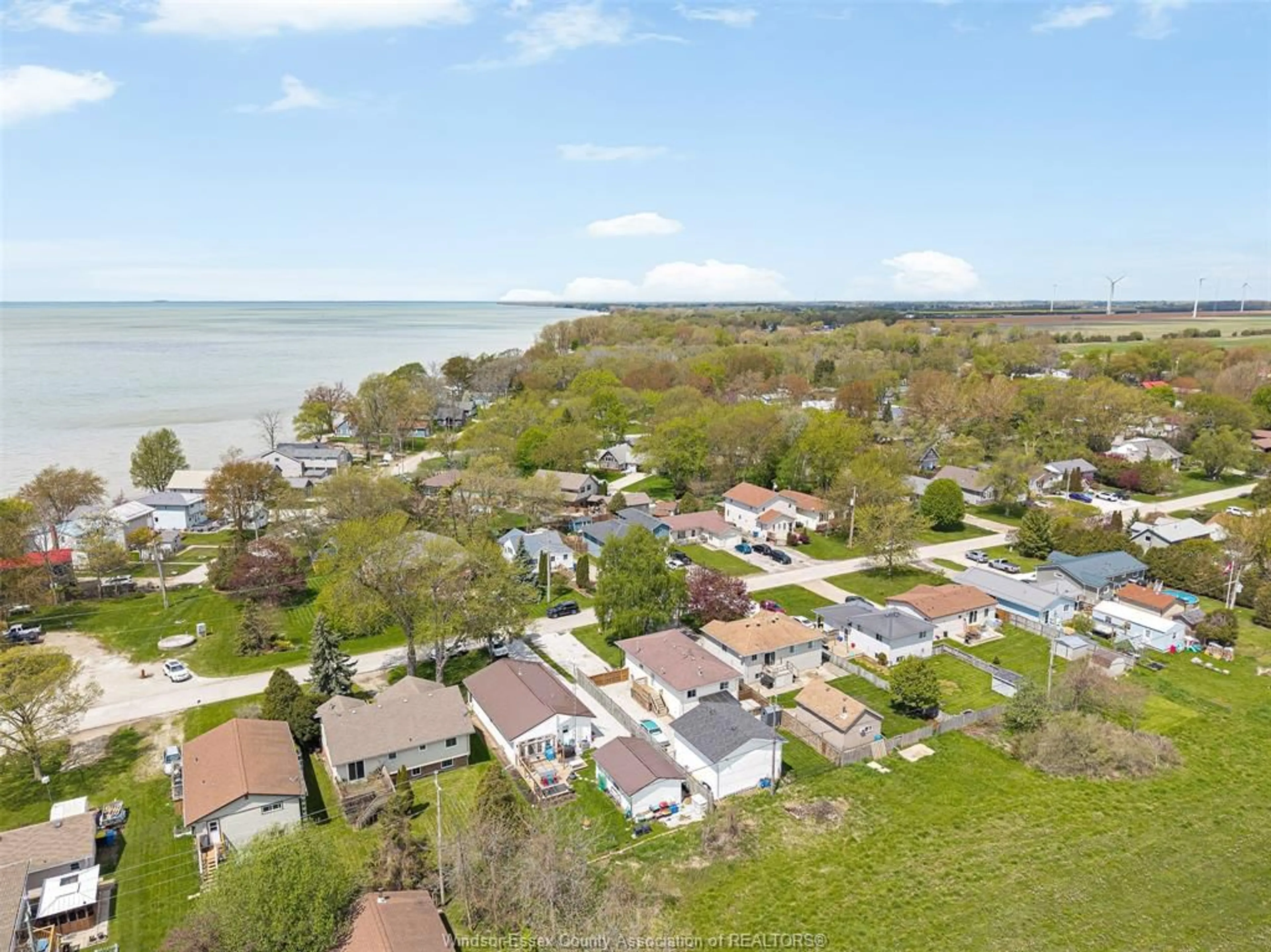 A pic from outside/outdoor area/front of a property/back of a property/a pic from drone, water/lake/river/ocean view for 114 GLOUCESTER Dr, Colchester Ontario N0R 1G0