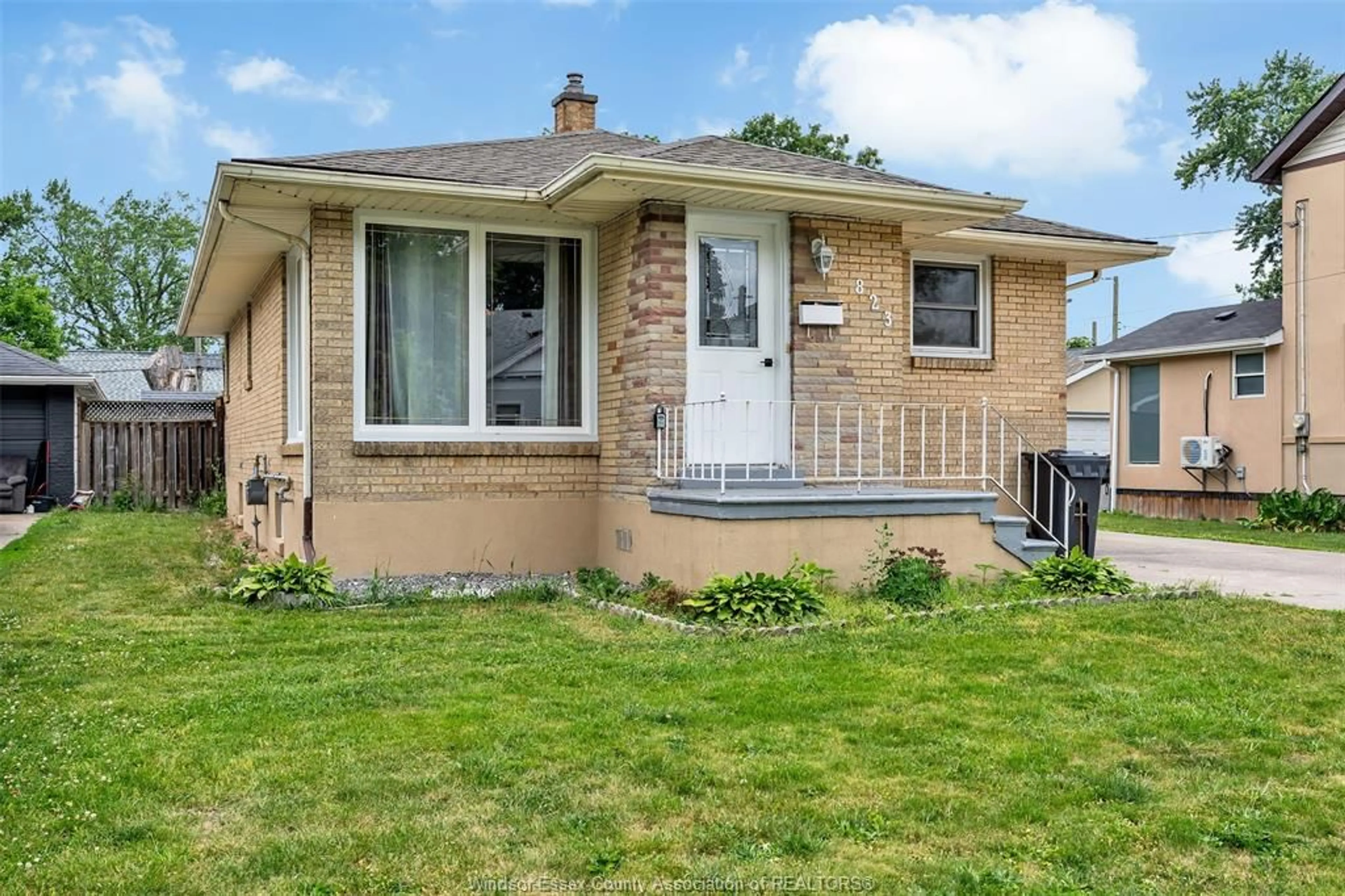 Home with brick exterior material, street for 823 JOS JANISSE Ave, Windsor Ontario N8Y 3A7