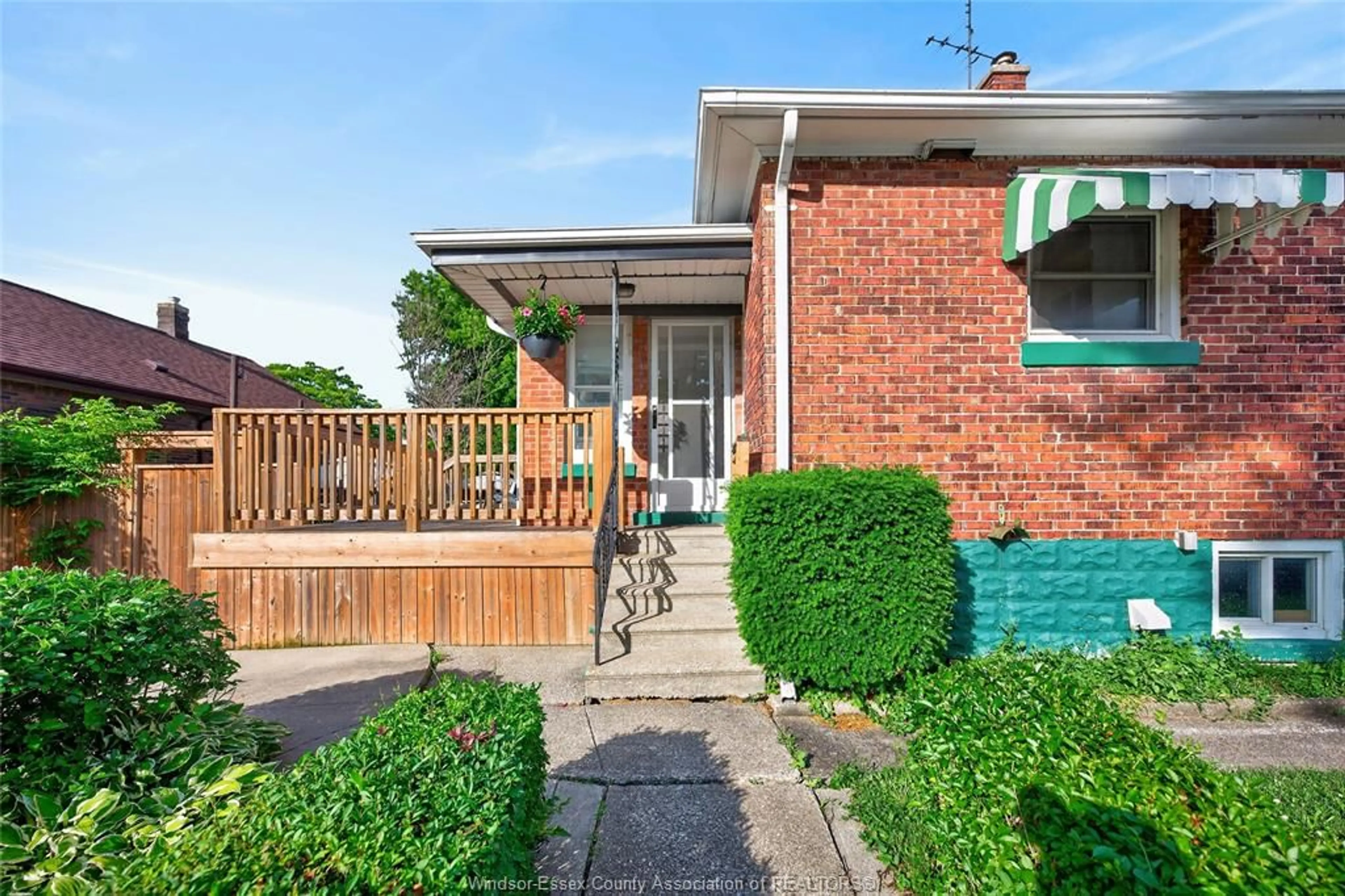 Home with brick exterior material, street for 1104 Ellis St E, Windsor Ontario N8X 2J3