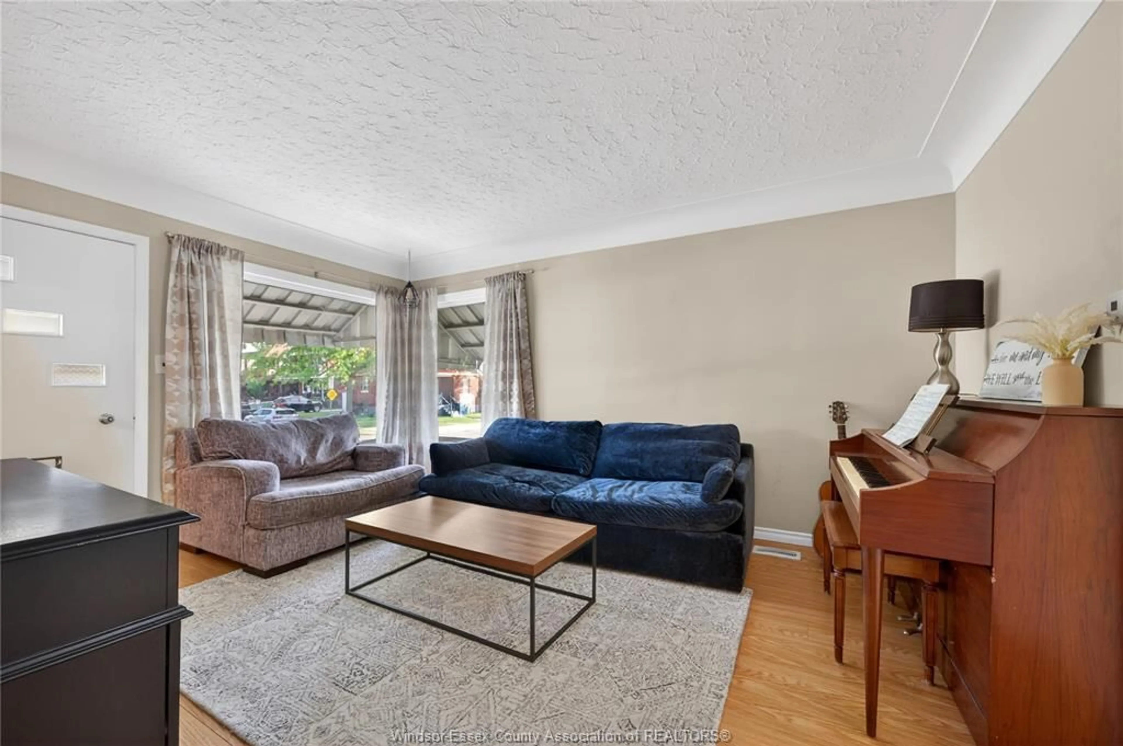 Living room with furniture, unknown for 1104 Ellis St E, Windsor Ontario N8X 2J3