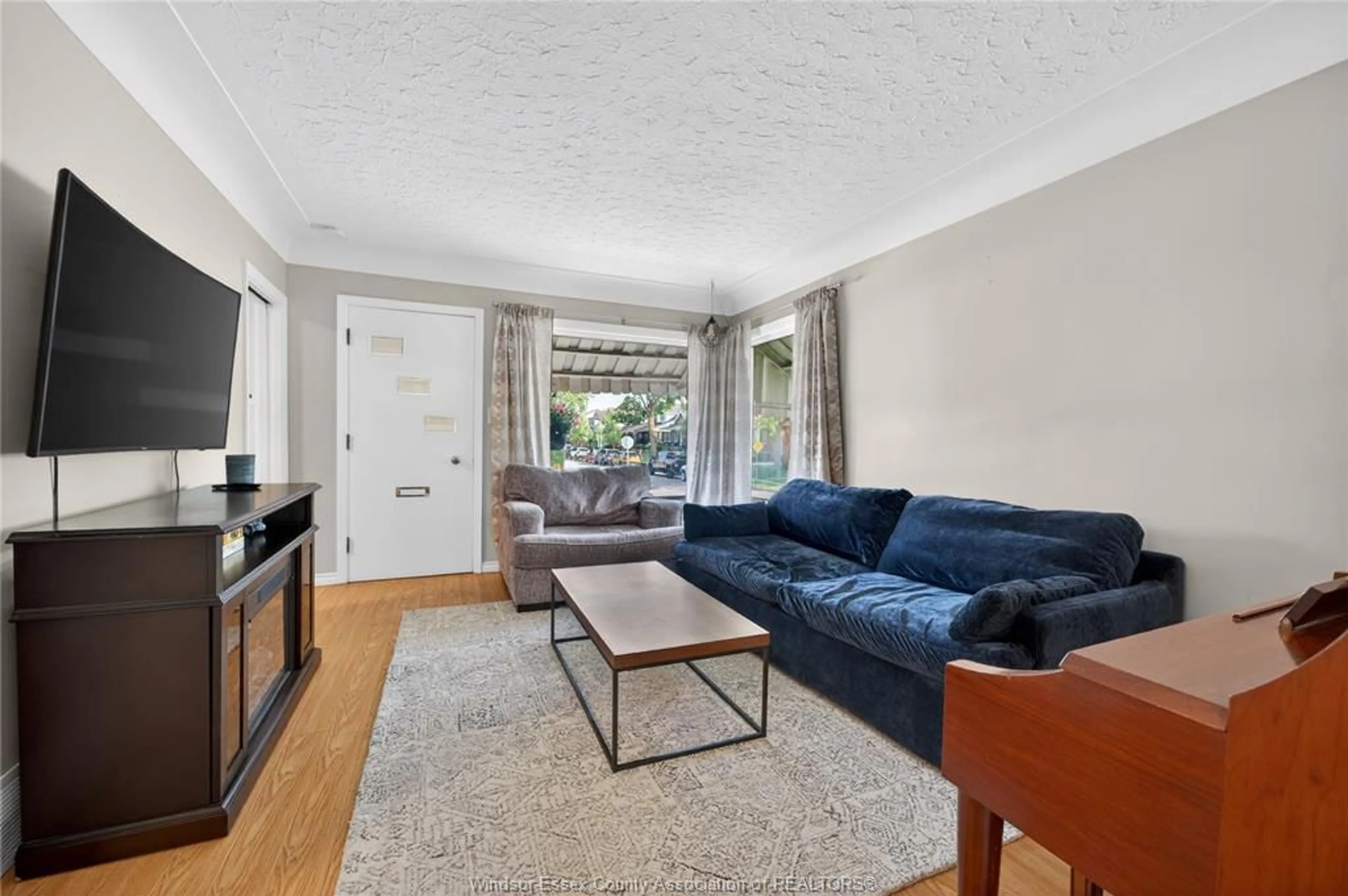 Living room with furniture, unknown for 1104 Ellis St E, Windsor Ontario N8X 2J3