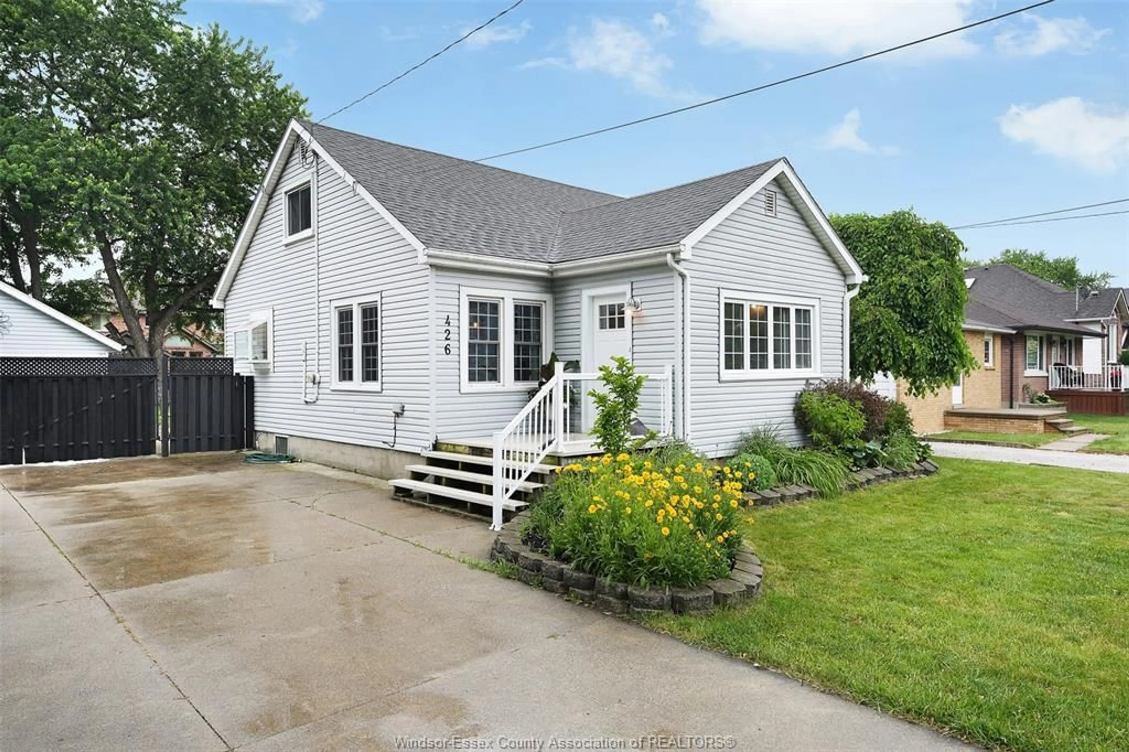 Home with vinyl exterior material, street for 426 ST. PIERRE, Tecumseh Ontario N8N 1Y9