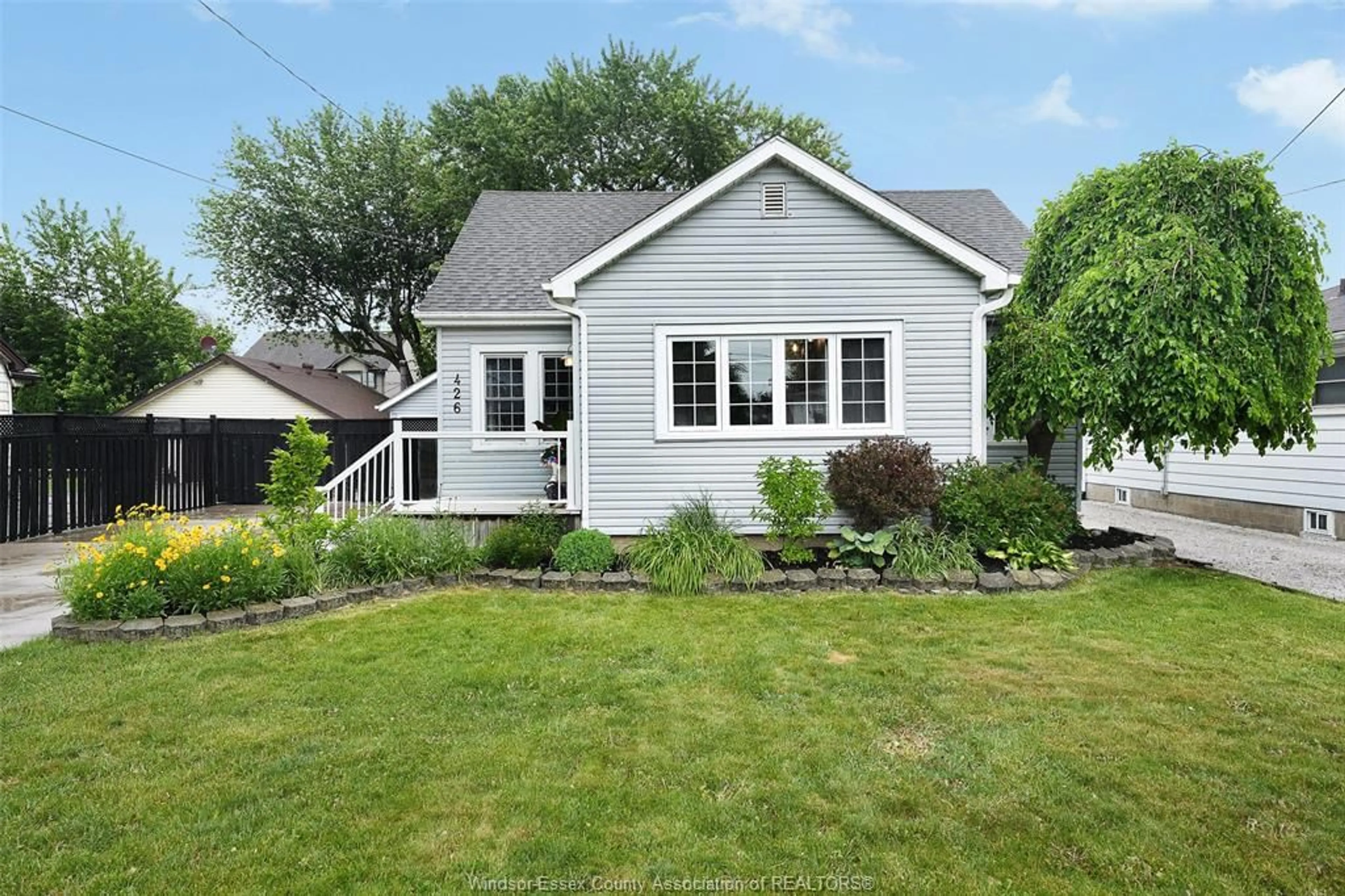 Home with vinyl exterior material, street for 426 ST. PIERRE, Tecumseh Ontario N8N 1Y9