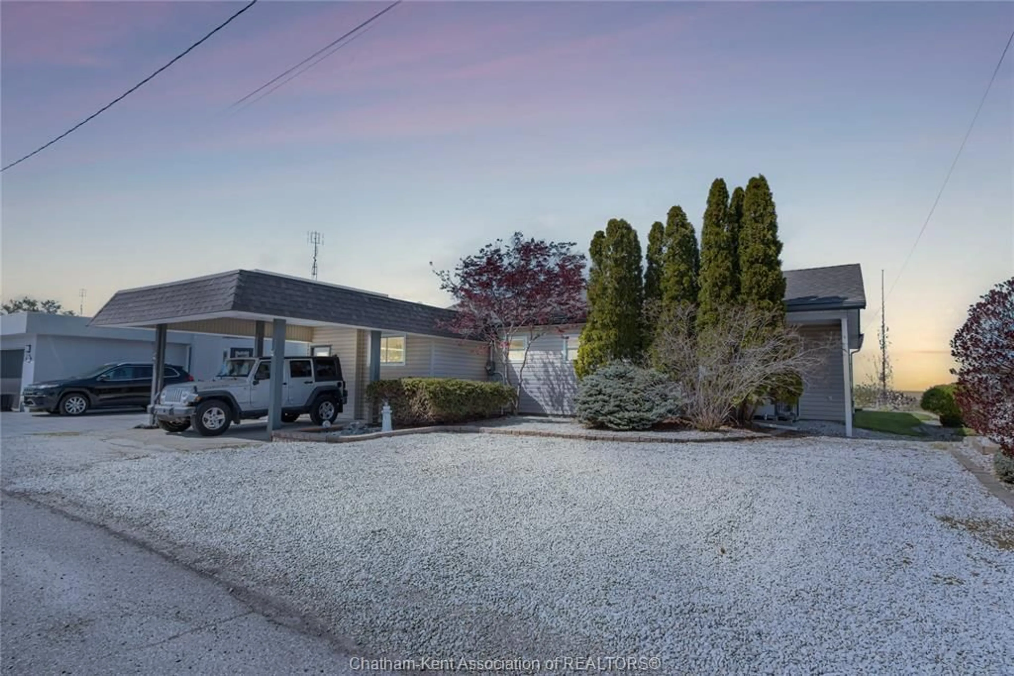 A pic from outside/outdoor area/front of a property/back of a property/a pic from drone, street for 19060 PENINSULA St, Lighthouse Cove Ontario N0P 2L0