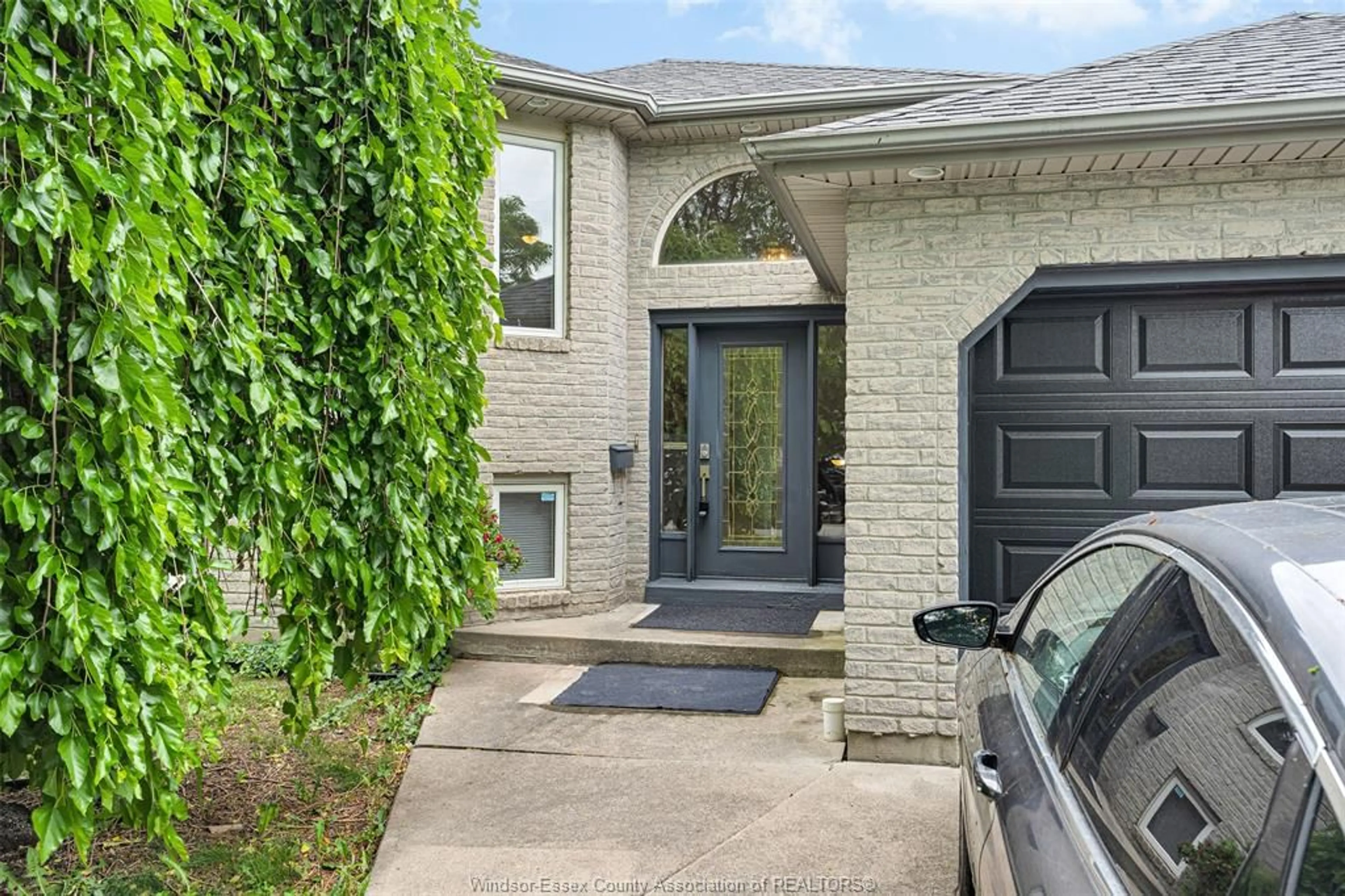 Home with brick exterior material, street for 3438 TREELINE Crt, Windsor Ontario N8R 2K3