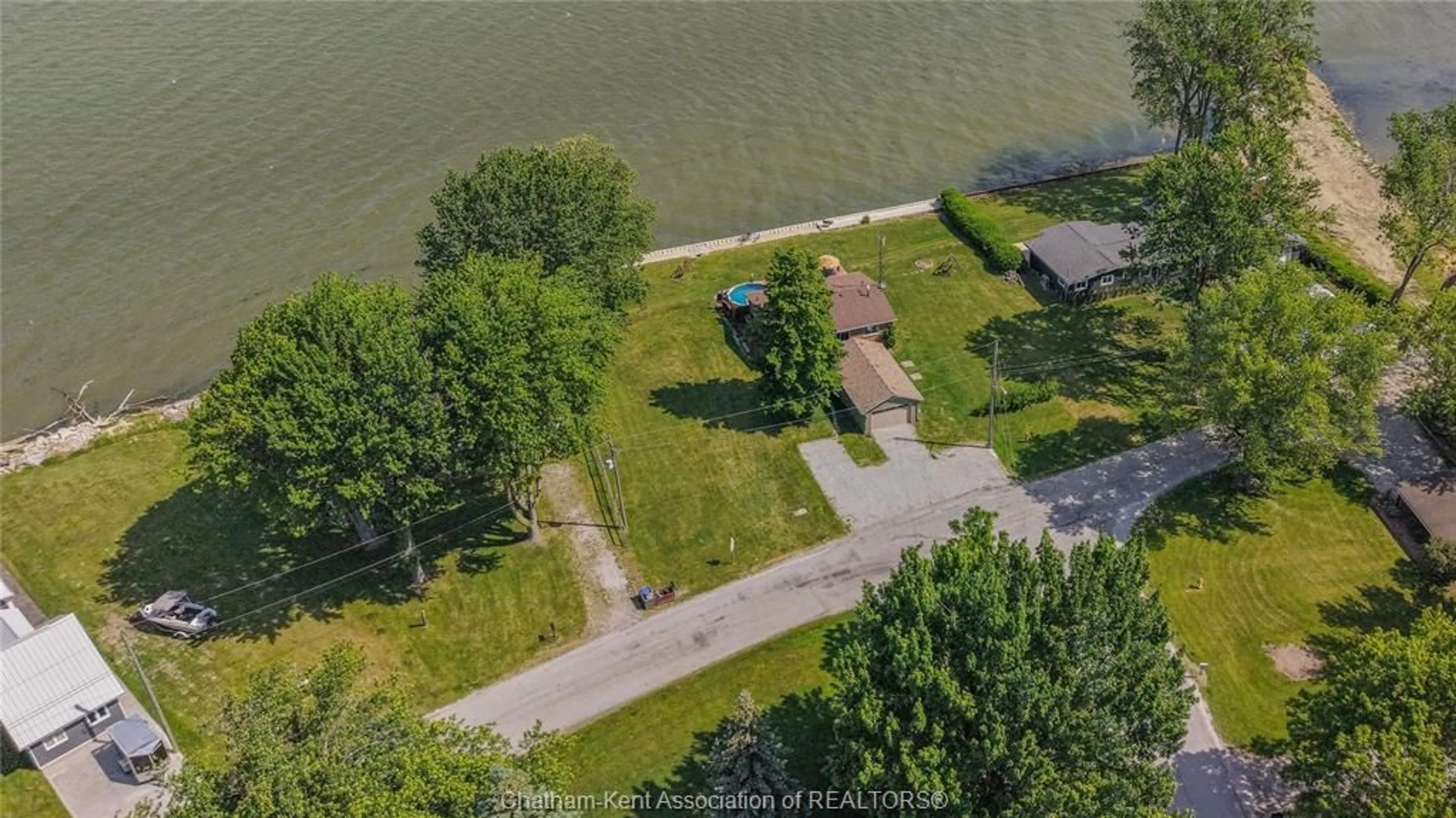 A pic from outside/outdoor area/front of a property/back of a property/a pic from drone, water/lake/river/ocean view for 85 ISLAND Cres, Lighthouse Cove Ontario N0P 2L0