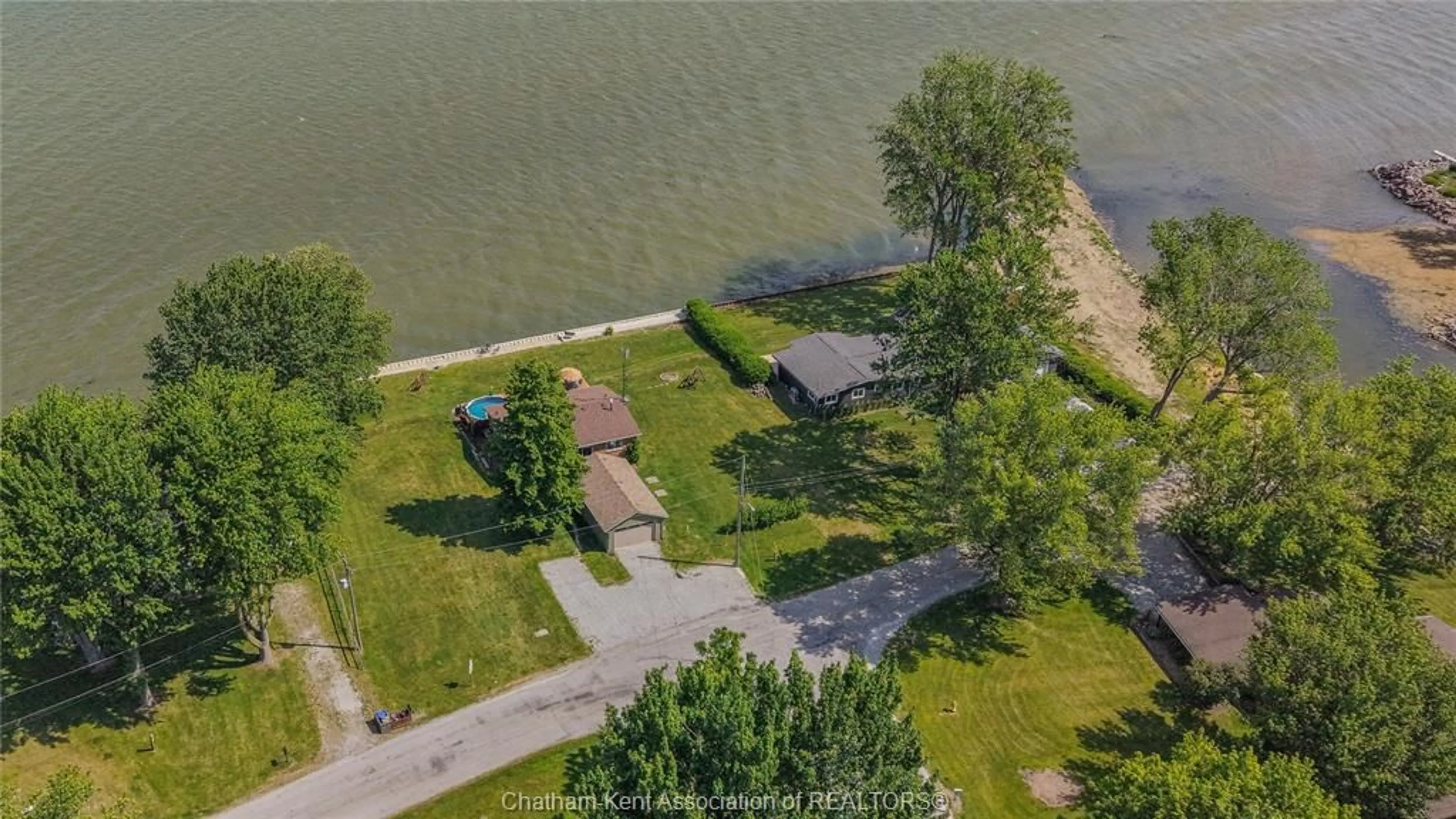 A pic from outside/outdoor area/front of a property/back of a property/a pic from drone, water/lake/river/ocean view for 105 ISLAND Cres, Lighthouse Cove Ontario N0P 2L0