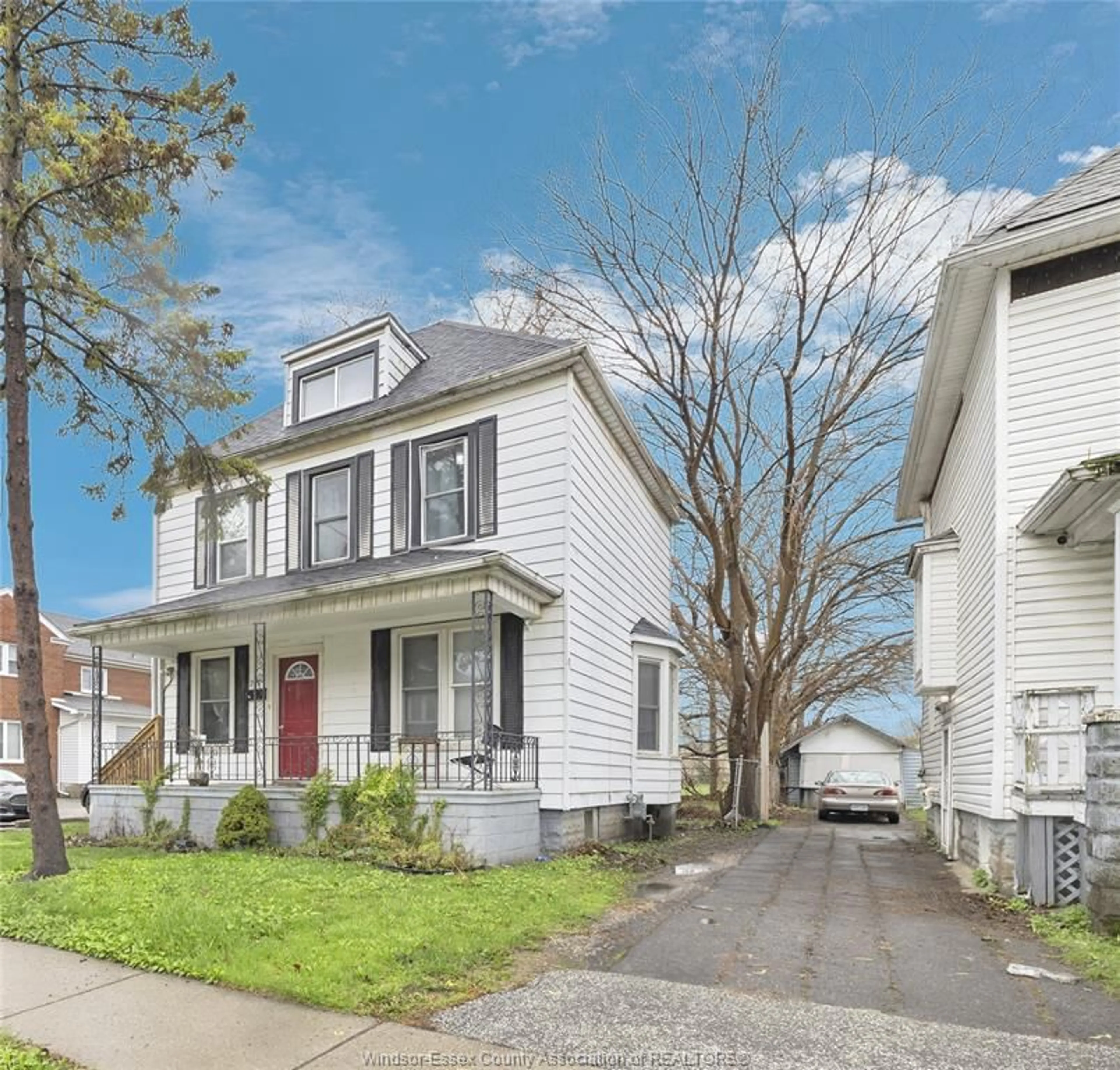Home with vinyl exterior material, street for 227 BRIDGE Ave, Windsor Ontario N9B 2M1